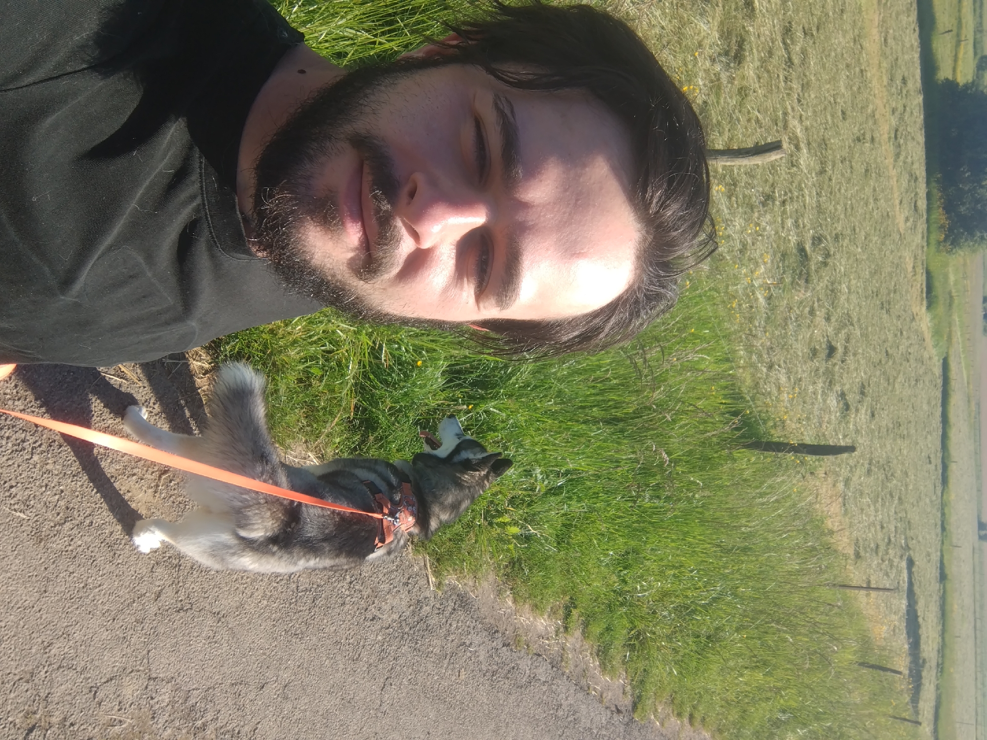 Man takes selfie with husky in Luxembourg countryside