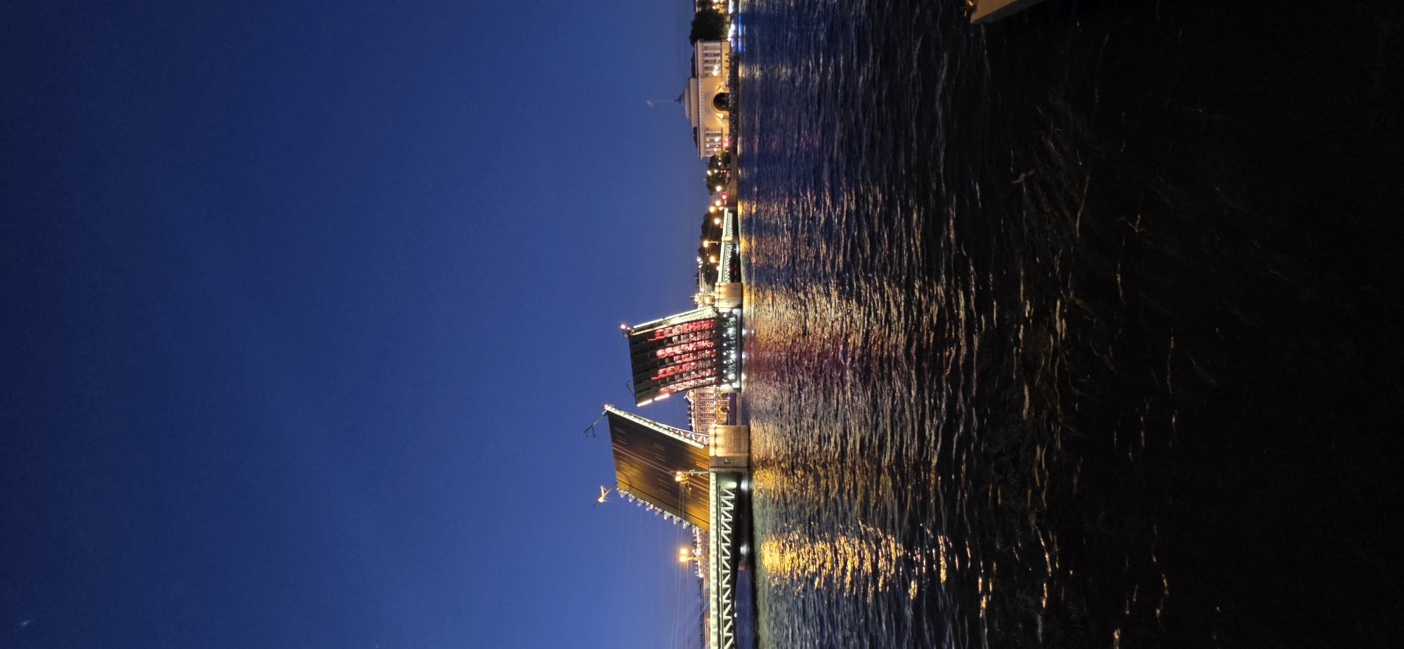Drawbridge goes up on a summer night downtown