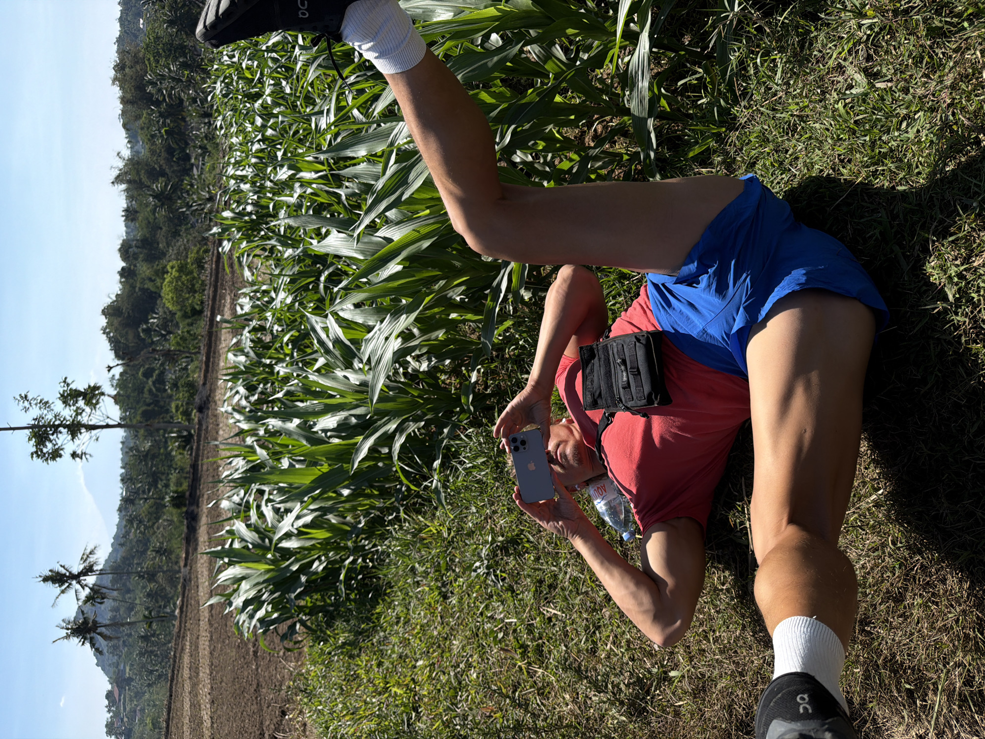 Resting by a cornfield in rural Dampit, Indonesia