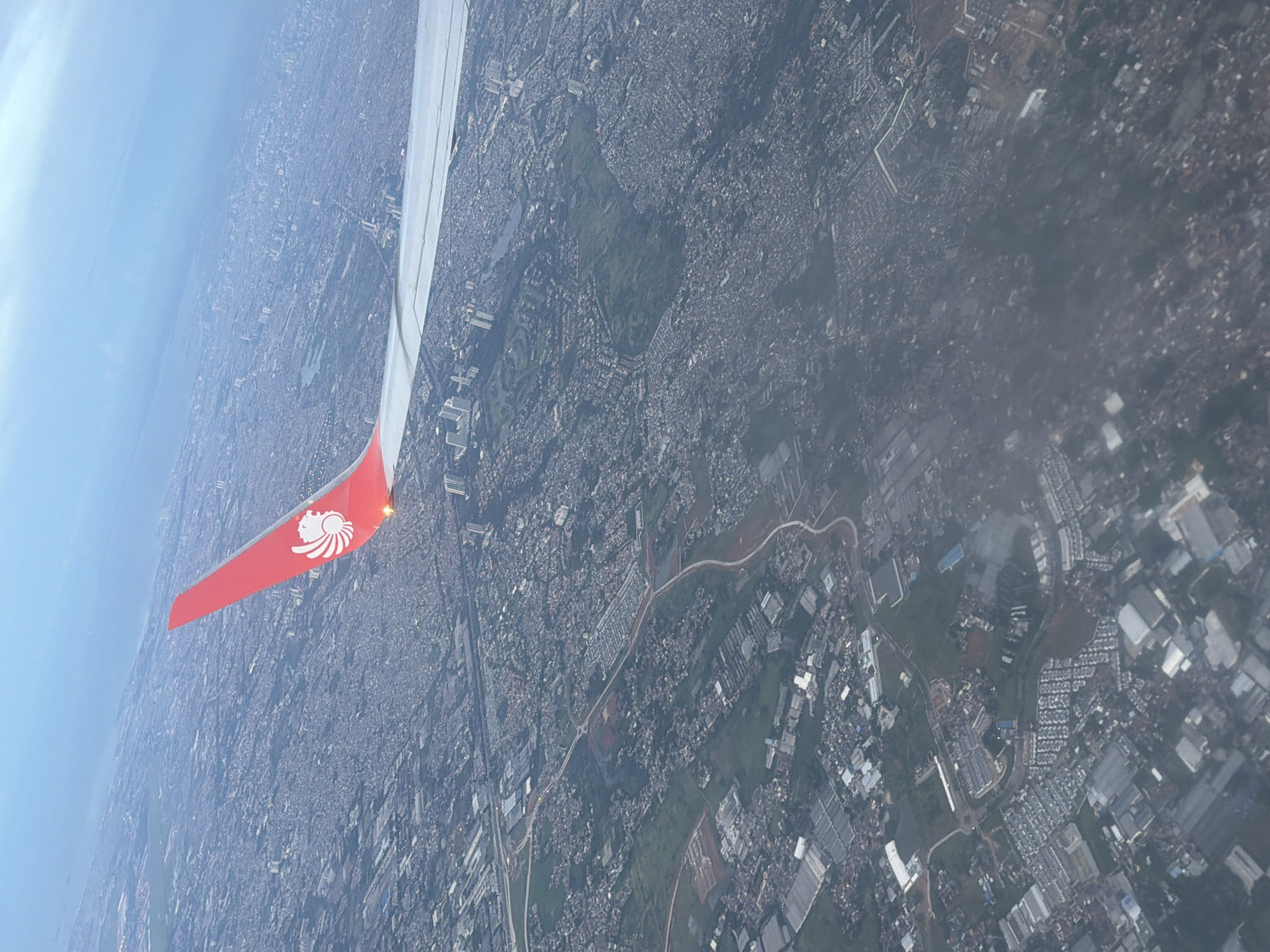 Aerial view captured over Ciakar, Indonesia from commercial aircraft