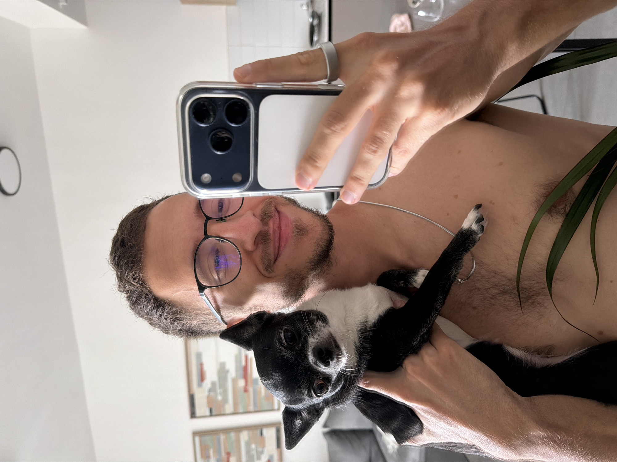 Man takes selfies with dog, companion in Tel Aviv building