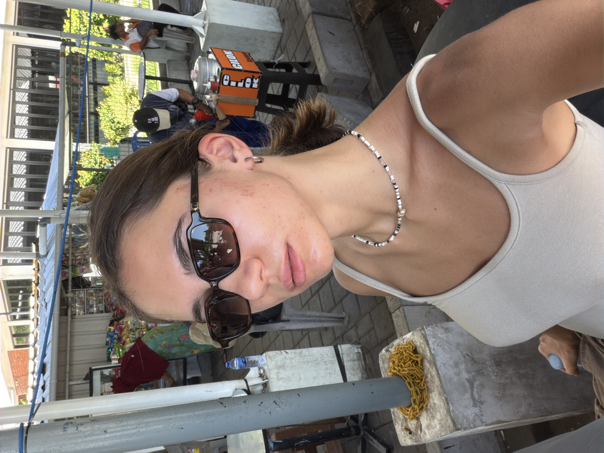 Casual moments captured at motorcycle parking area in Gunung Malang