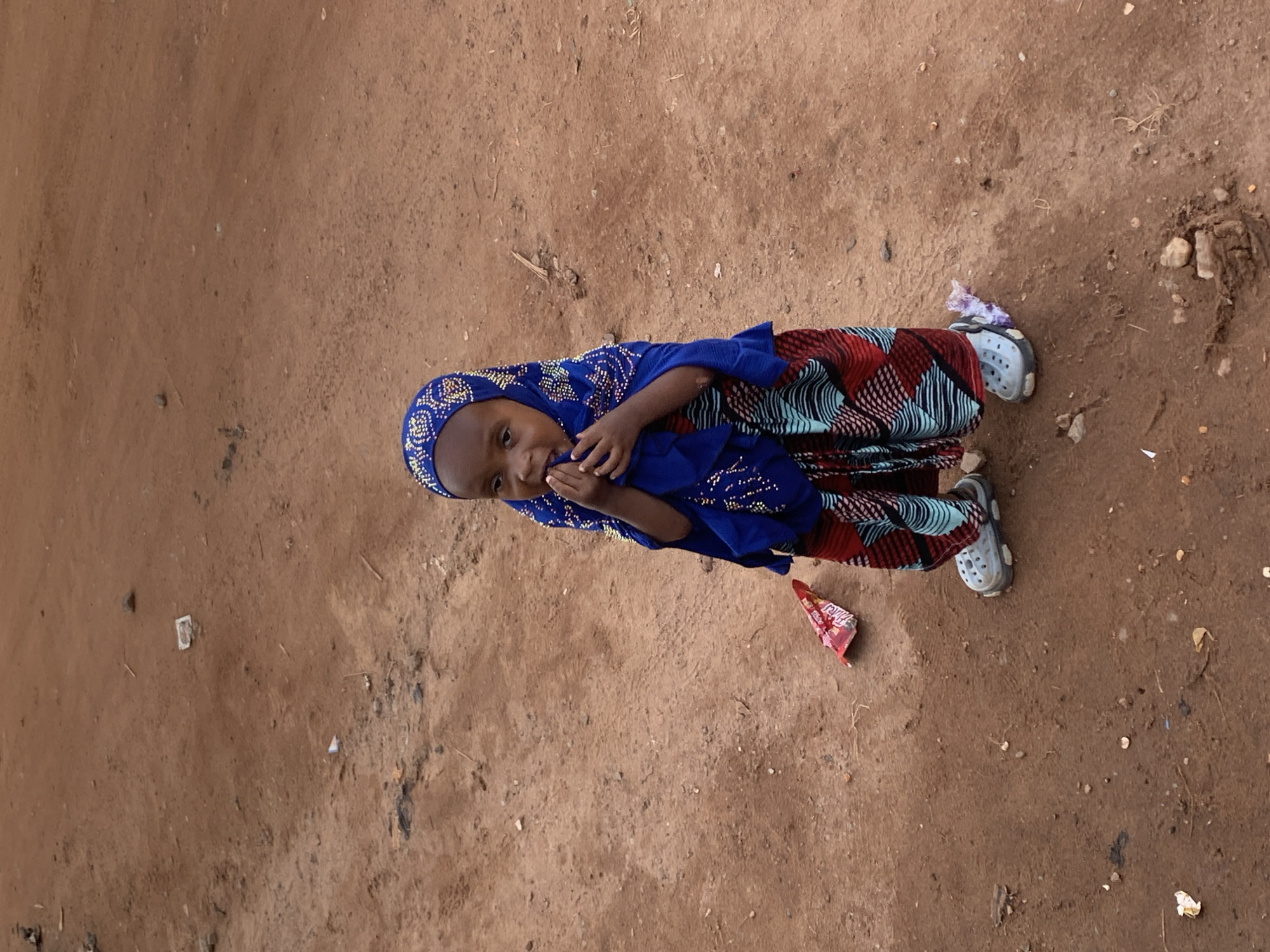 Daily street life documented in Abuja market district