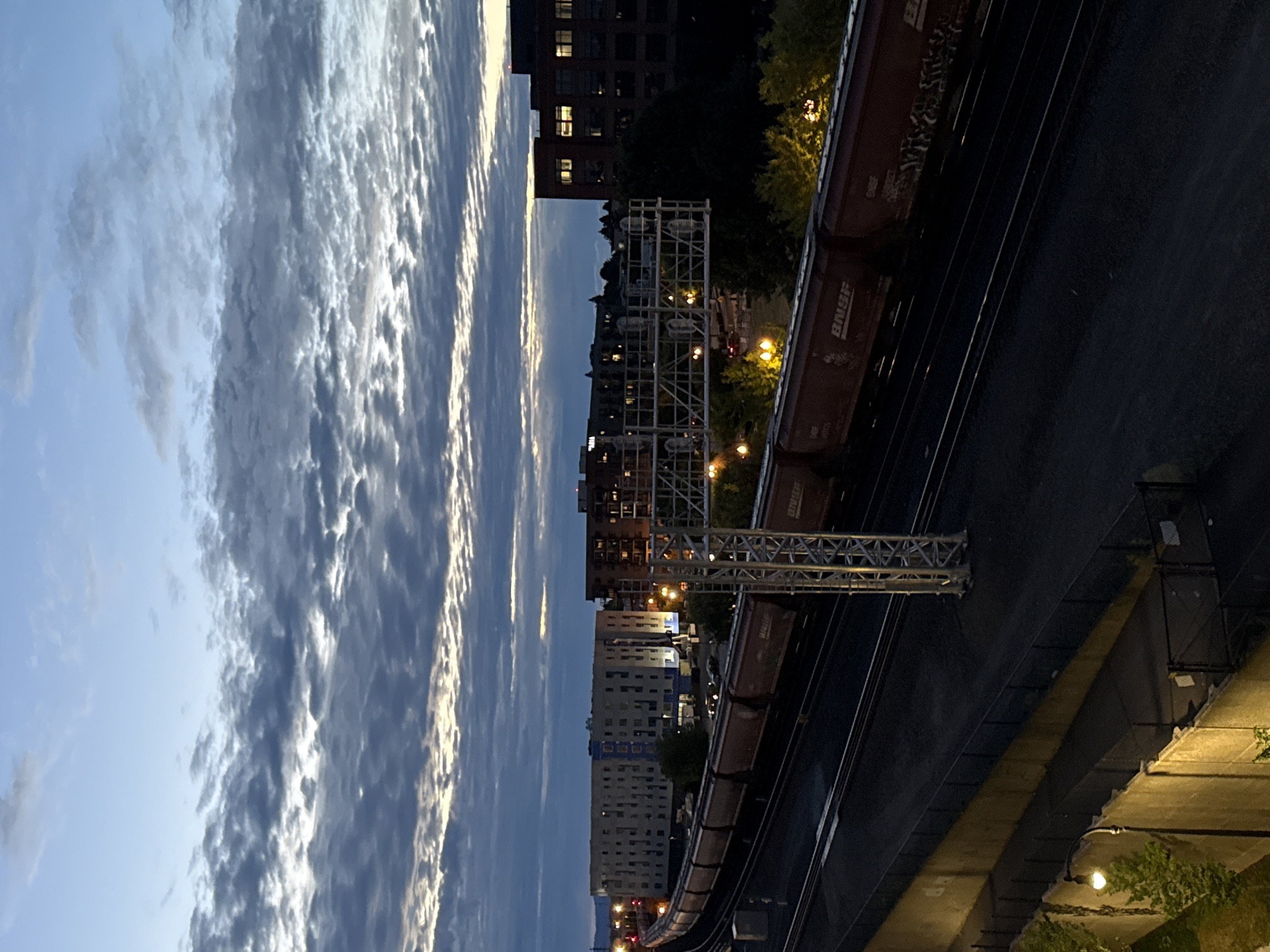 BNSF freight train moves through Vancouver, WA at dusk
