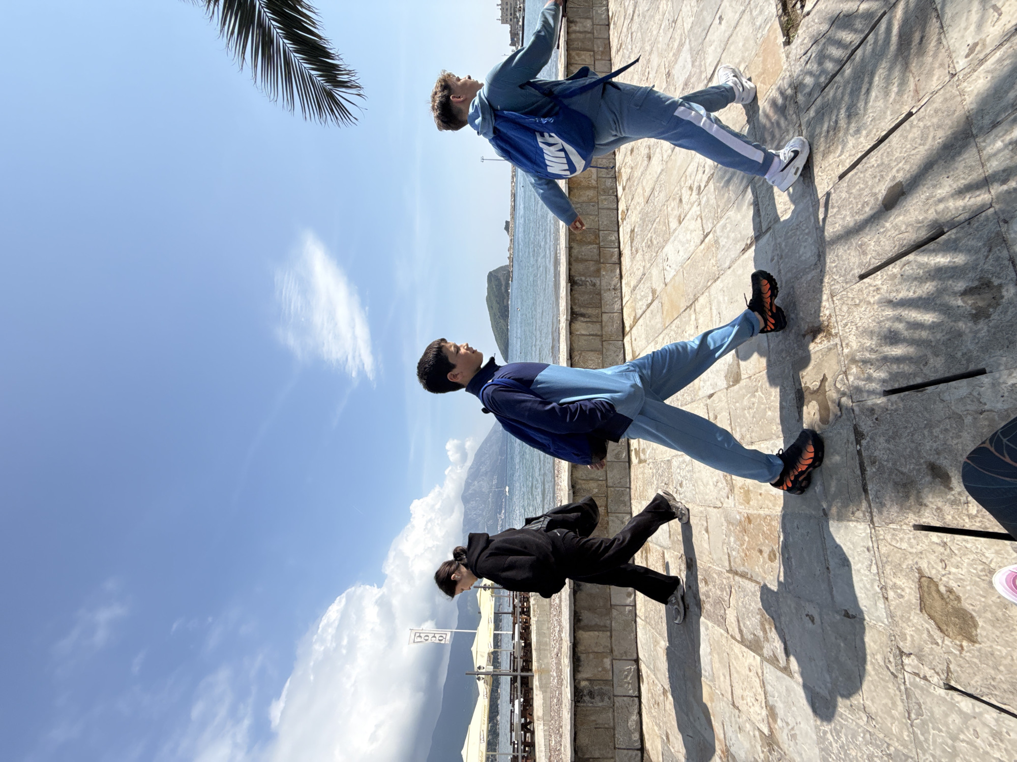 Sunny day brings visitors to Budva's scenic waterfront promenade