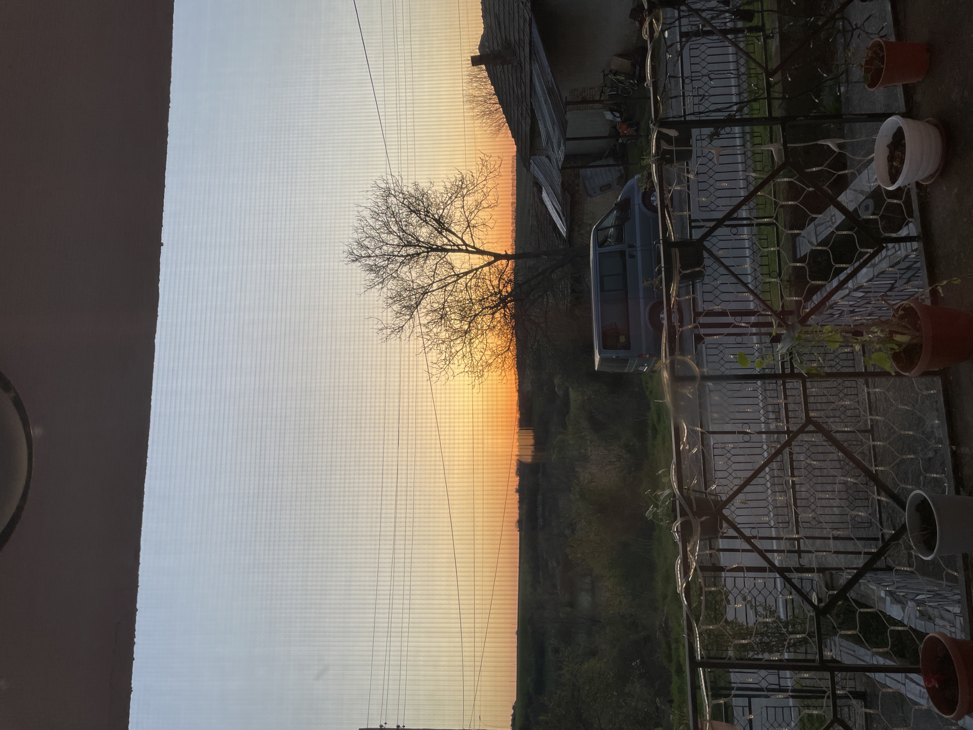 Sunset viewed from ornate balcony in Voditsa, Bulgaria