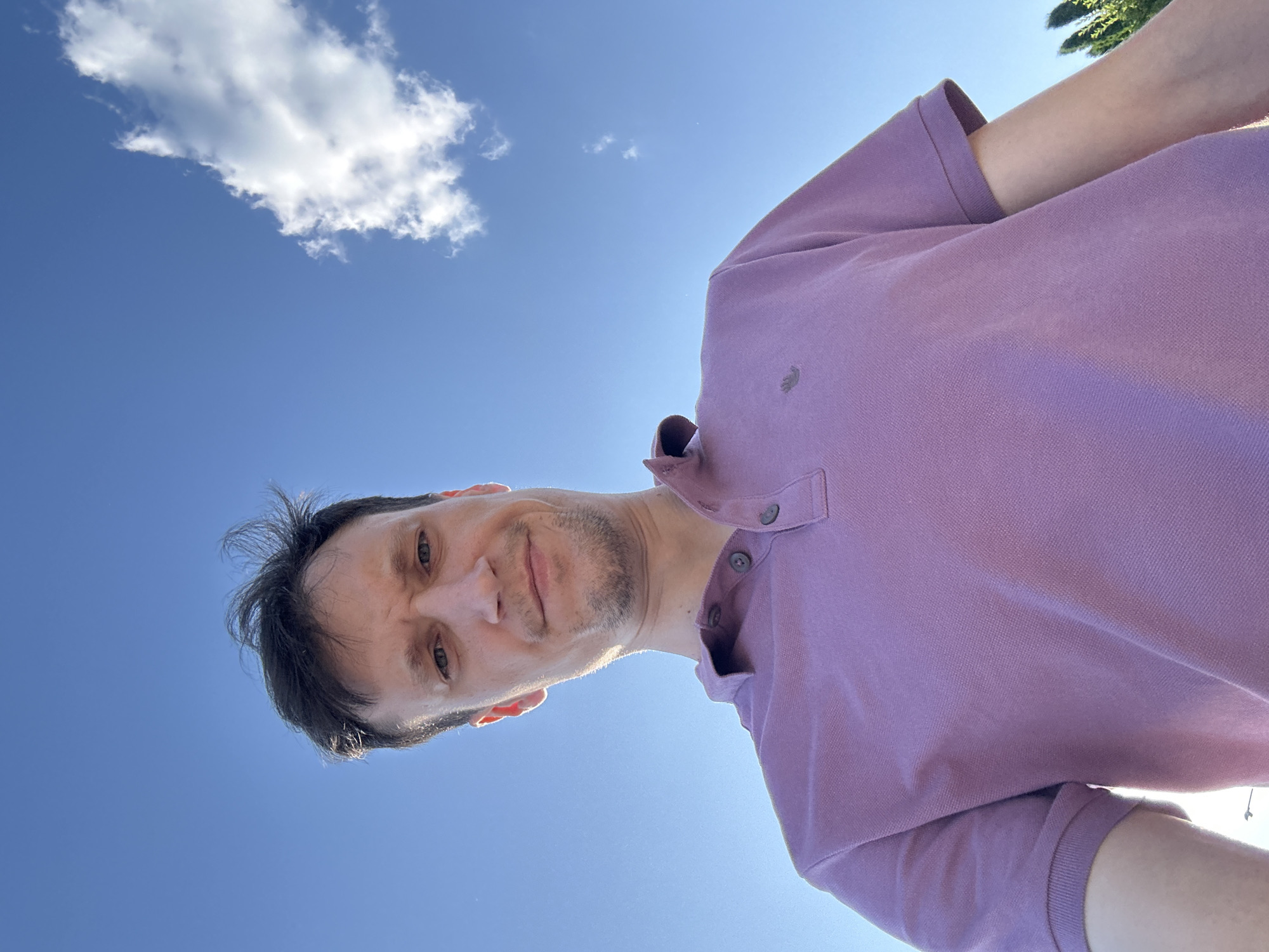 Low-angle outdoor portraits in a purple polo, Makiv, Ukraine