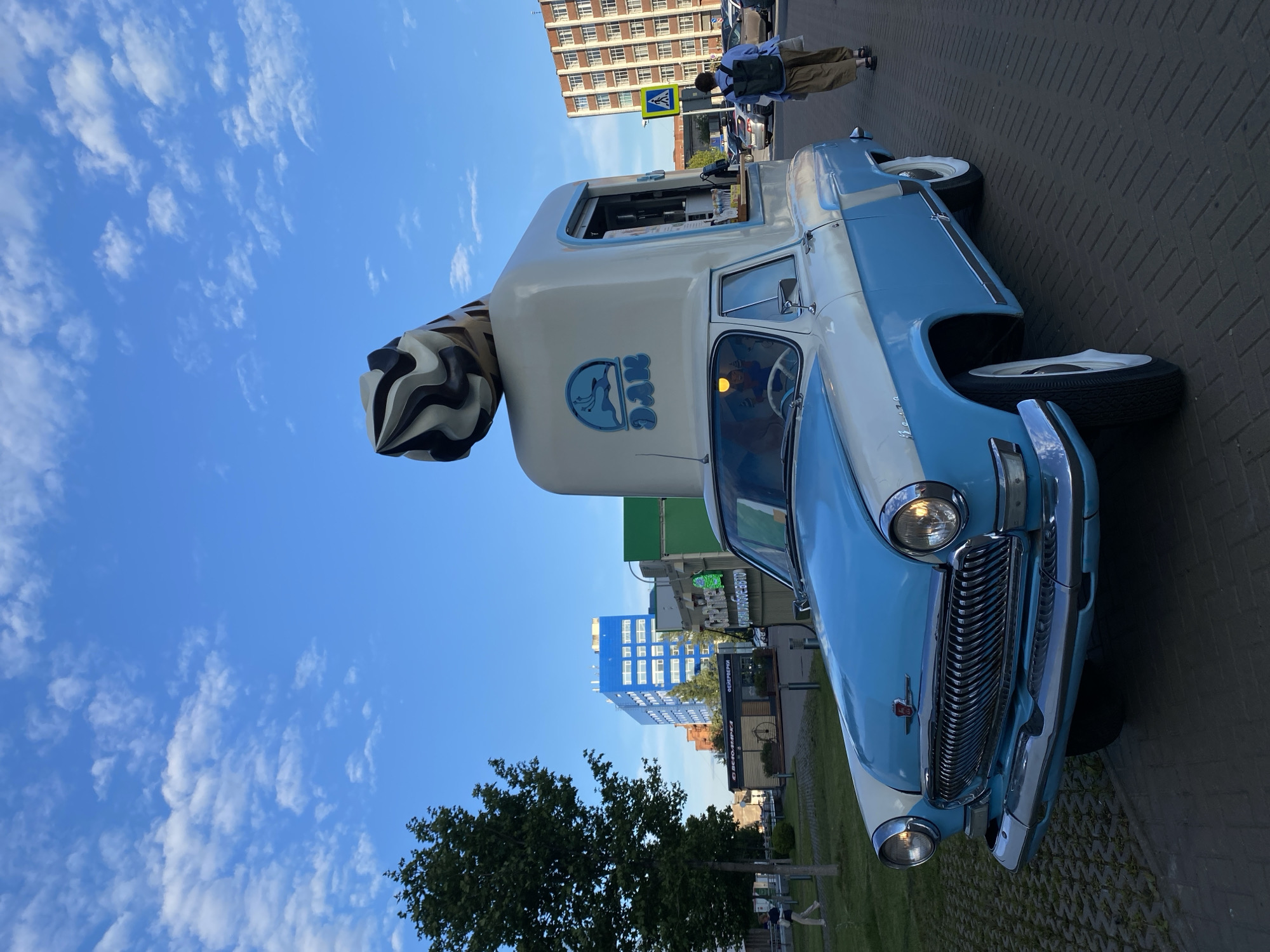 Ice cream truck and a foamy drink on a Russian afternoon
