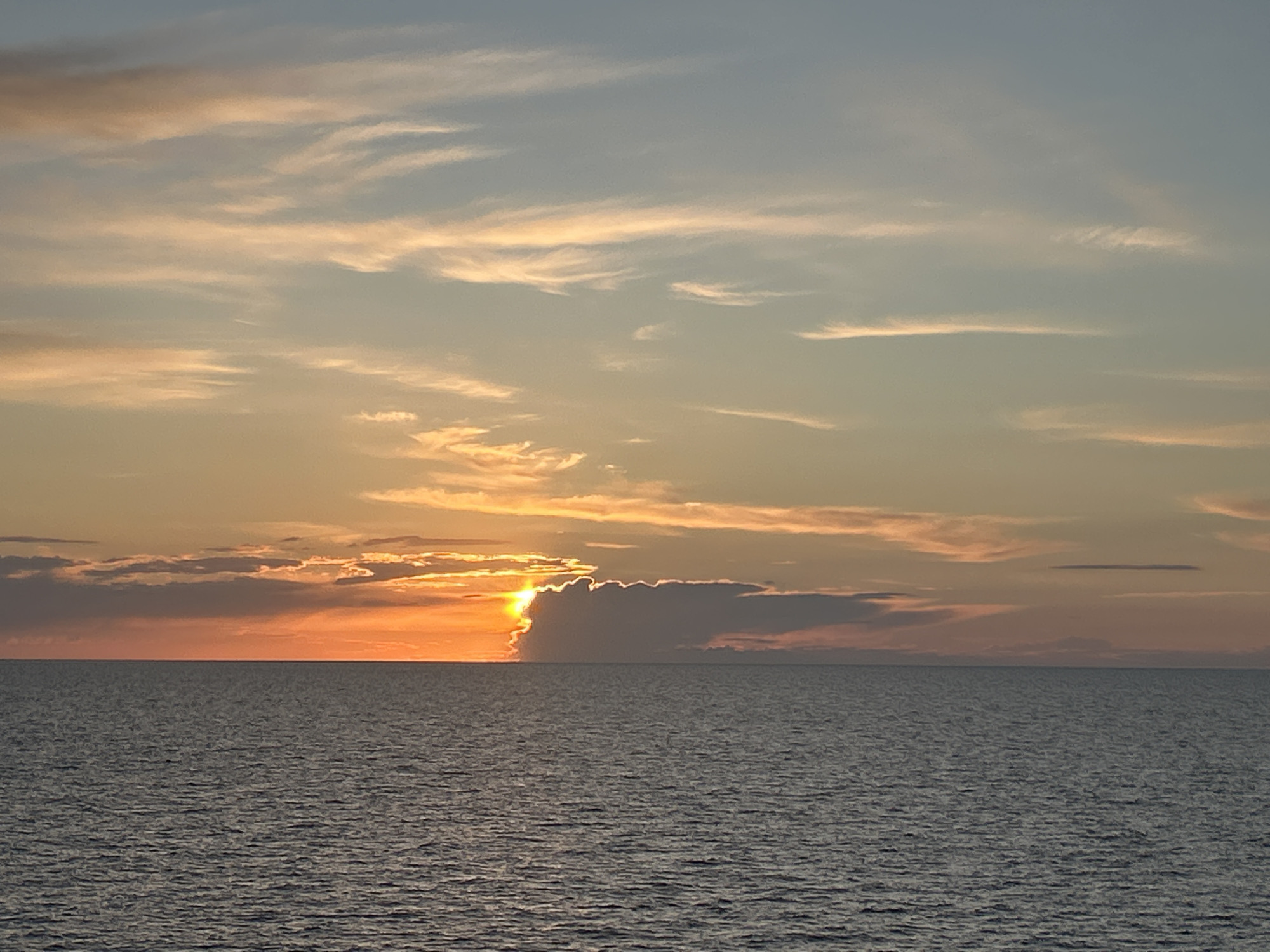 Sunset maritime operations documented near Baltic construction vessel TITANS
