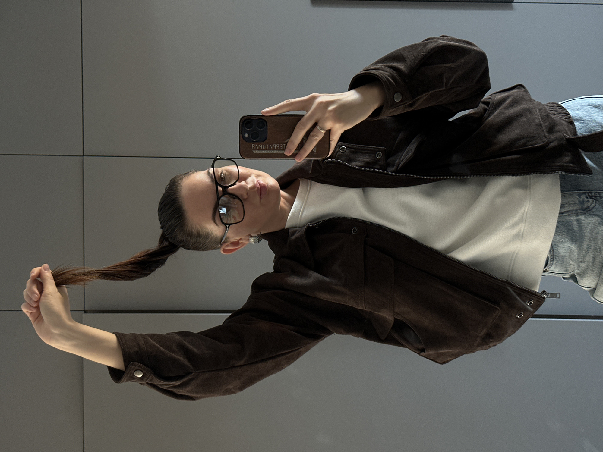 Woman takes selfie while posing in Chaikovsky, Russia