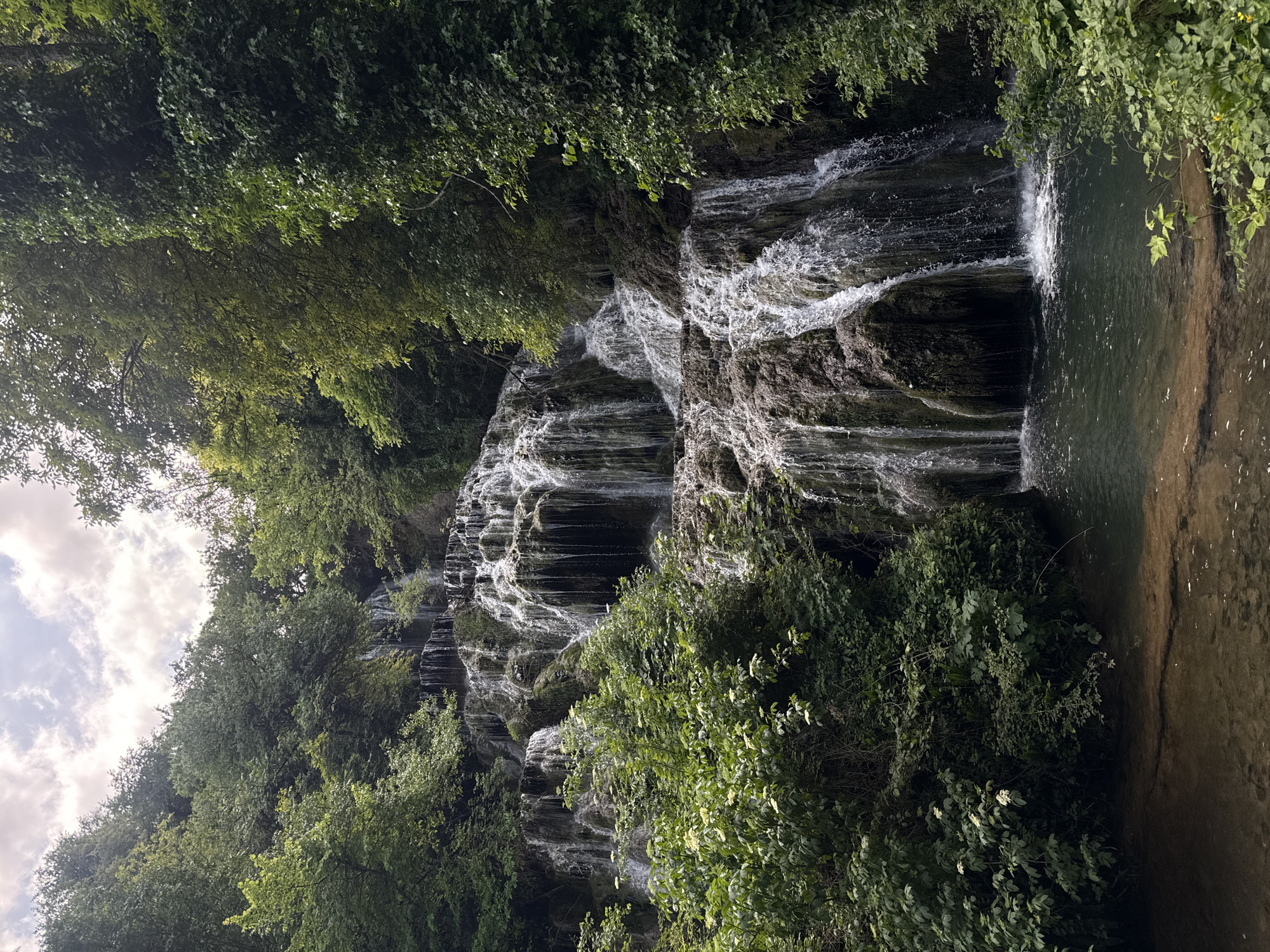 Waterfall observed cascading down terraces in Krushuna, Bulgaria