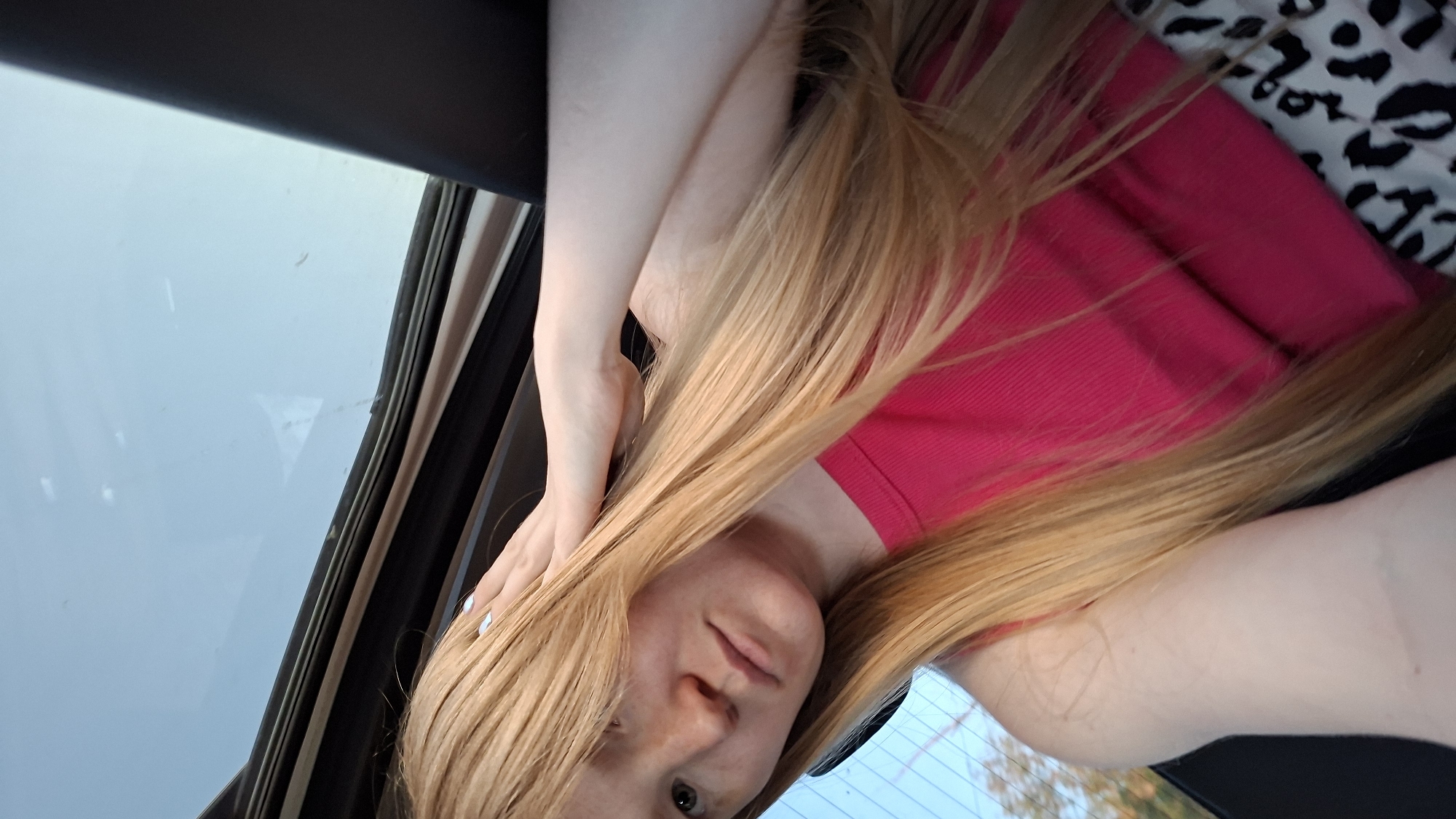 Woman photographed in vehicle in Большой Букор, Russia