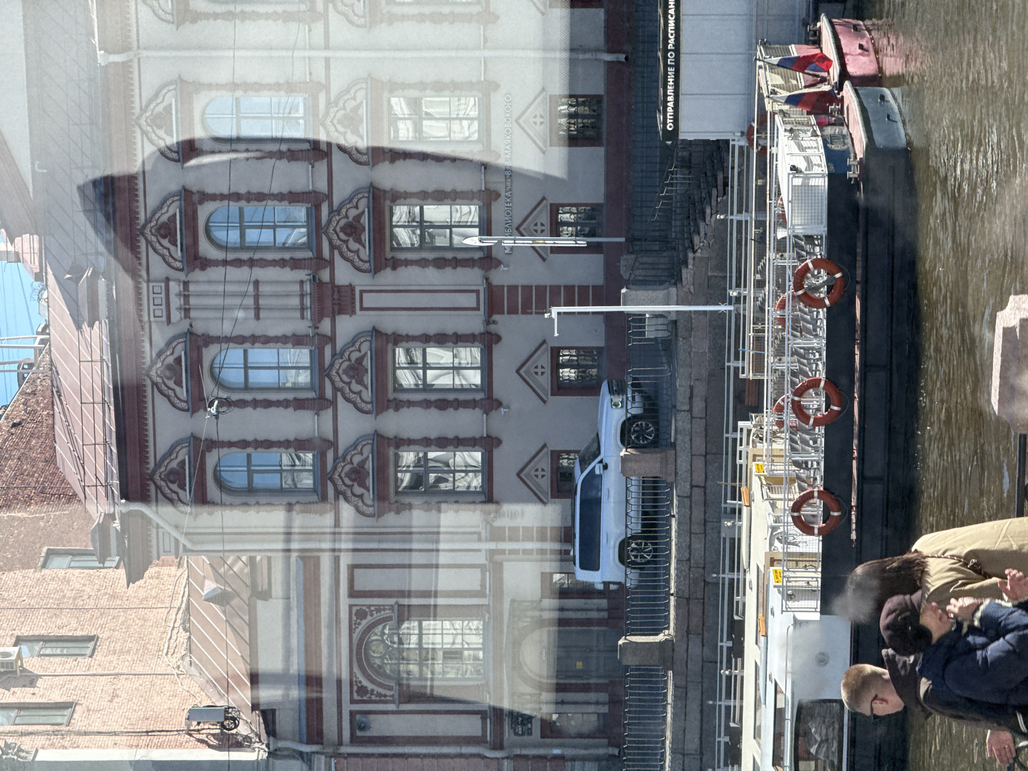 Morning sightseeing captures historic Saint Petersburg architecture, pedestrians