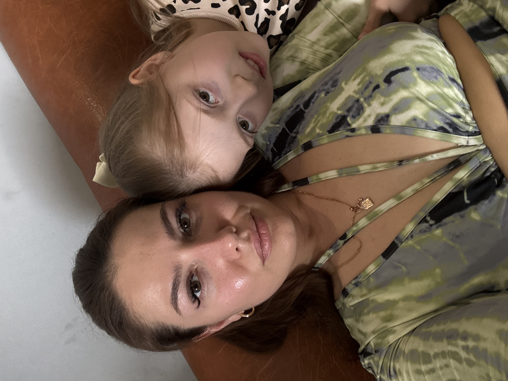 Casual indoor portraits of two people, close and relaxed