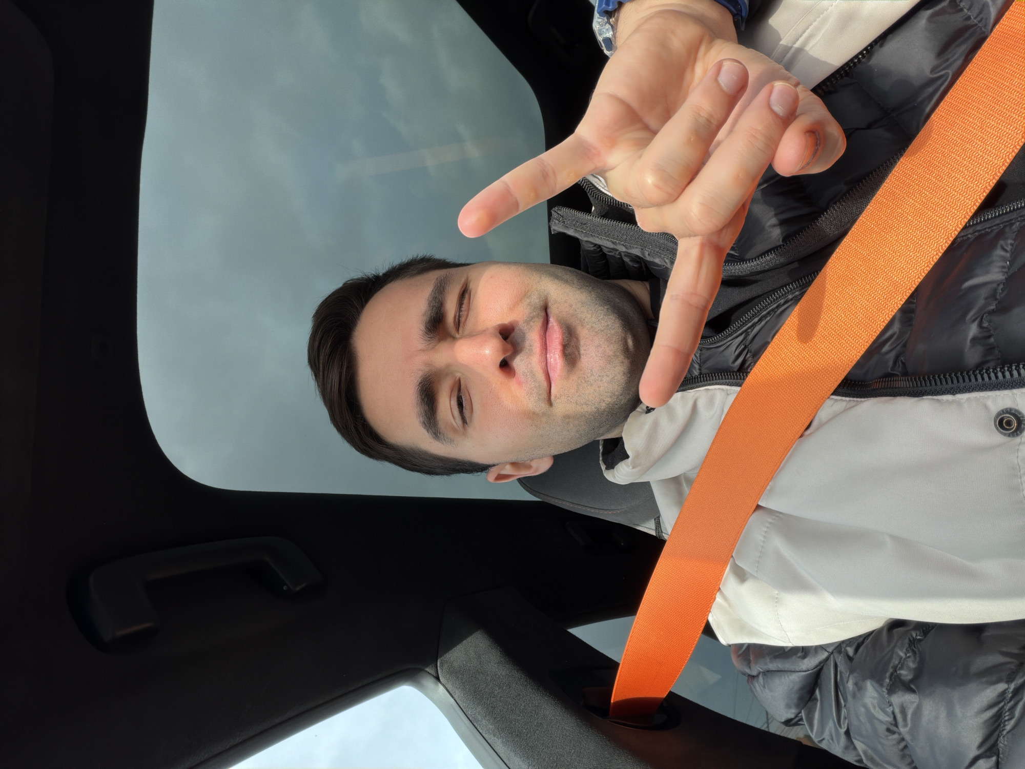 Man takes selfie with child in car in Krasnoyarsk