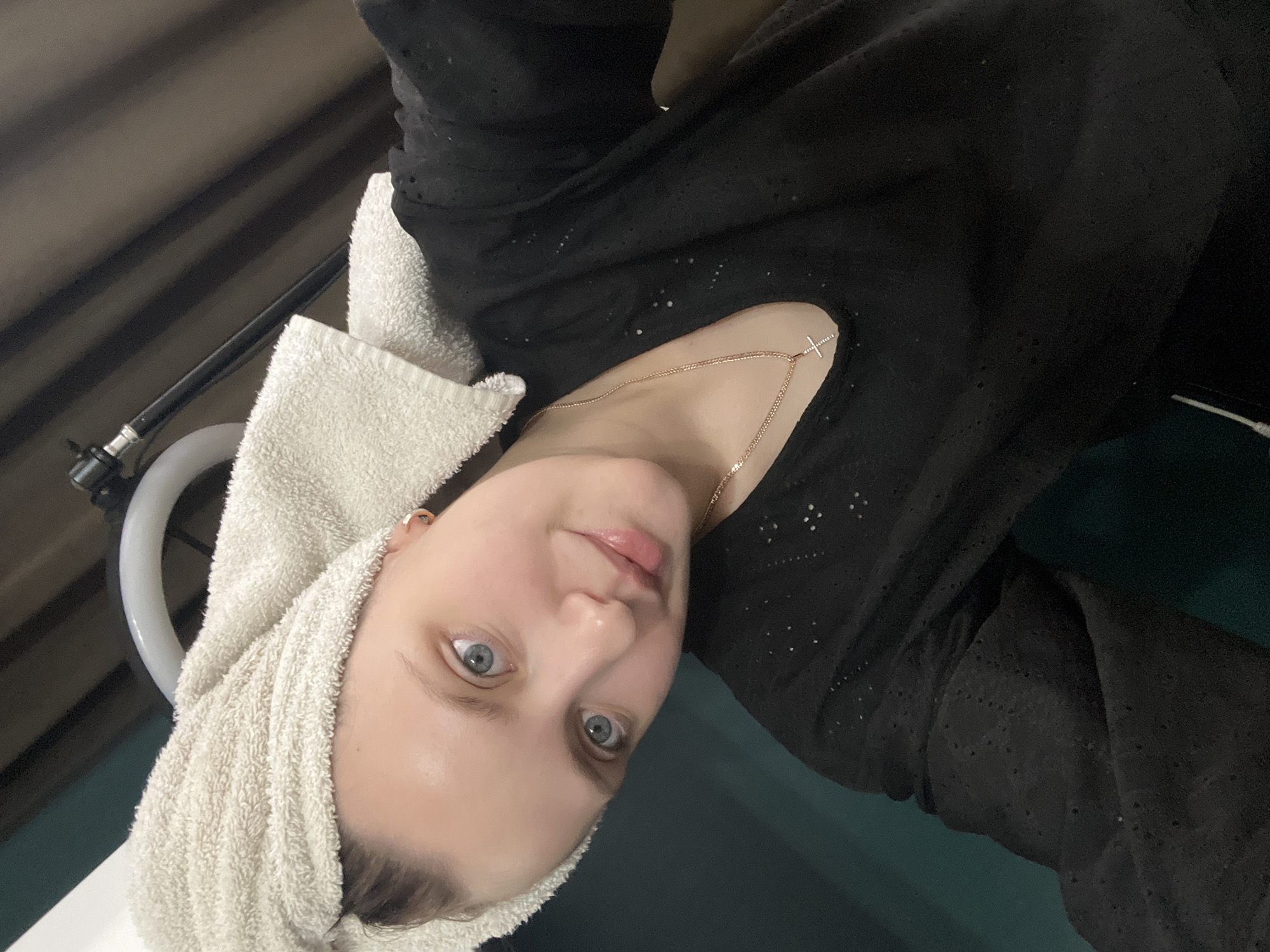 Woman takes indoor selfies in Марковский, Russia