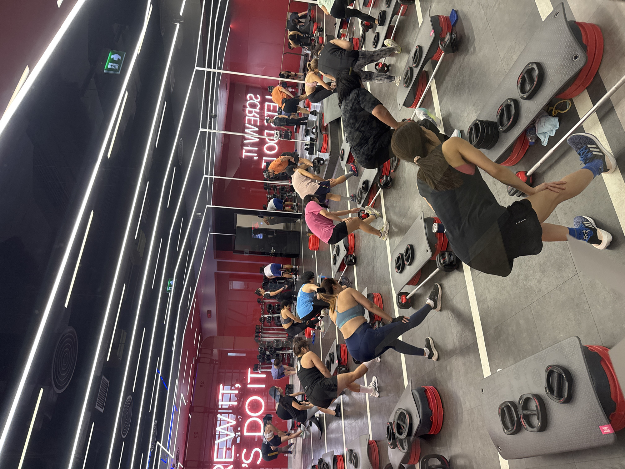 Inside a Chiang Mai fitness studio during a busy morning session