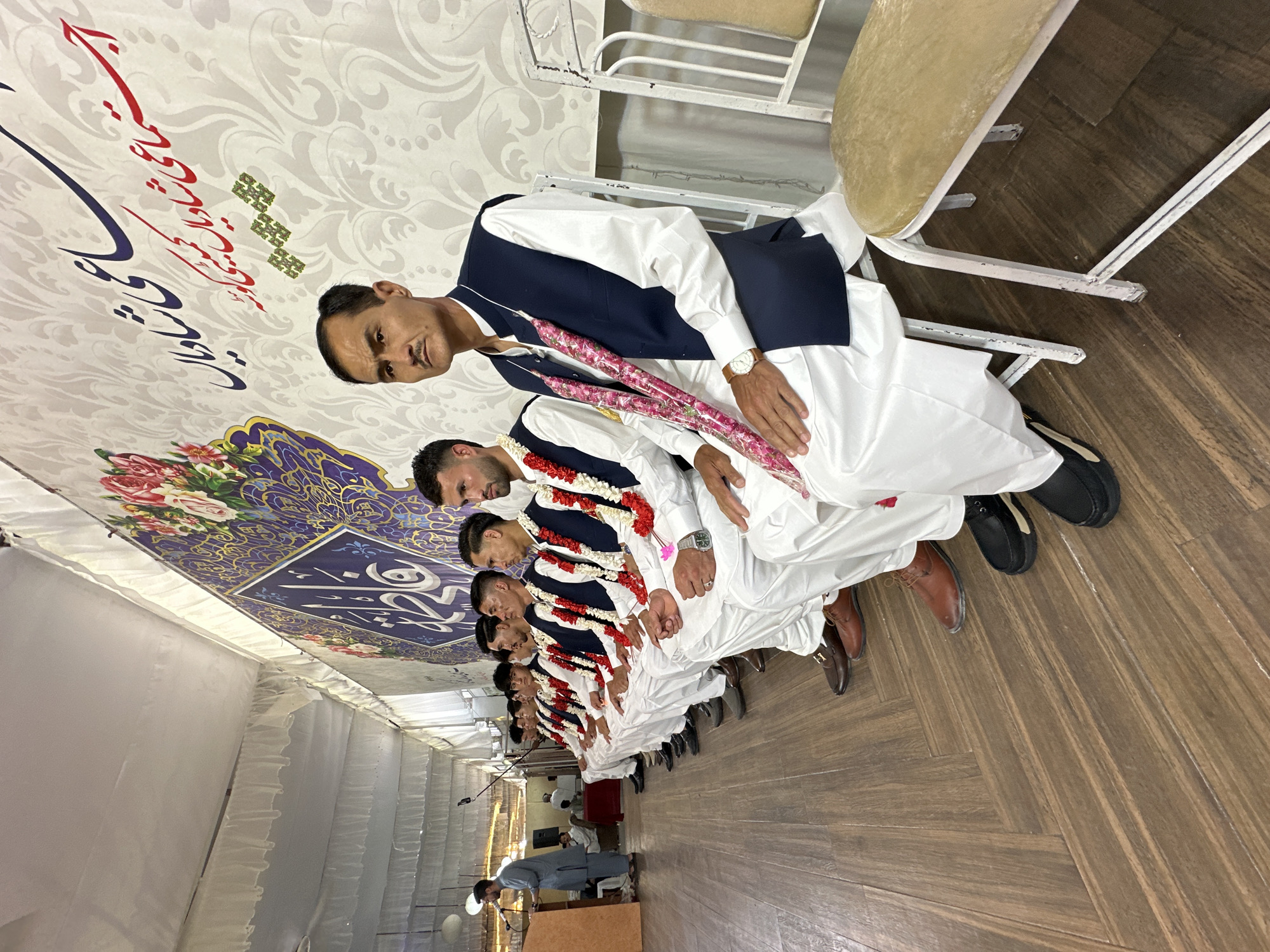 Traditional ceremony with garland-wearing participants observed in Quetta