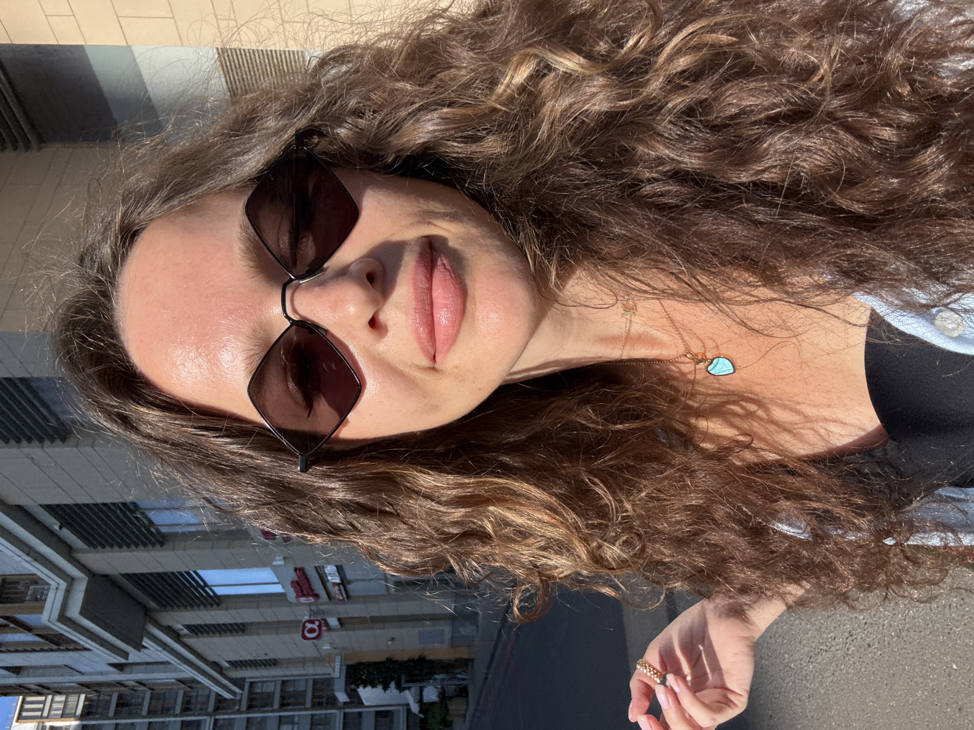 Café stop and selfies near Moscow high-rises on a sunny afternoon