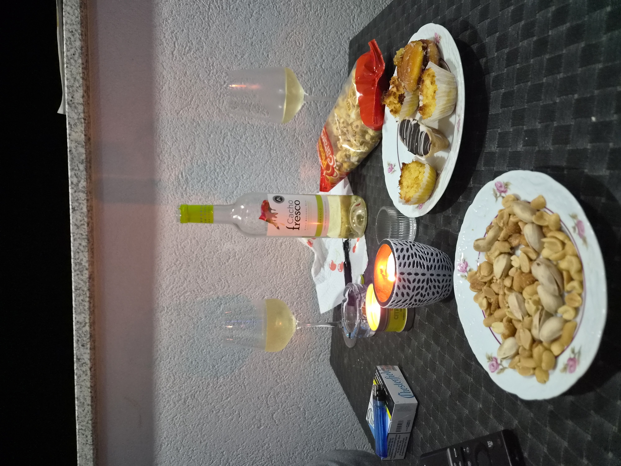 Quiet evening documented in Barcelos home with wine, candles