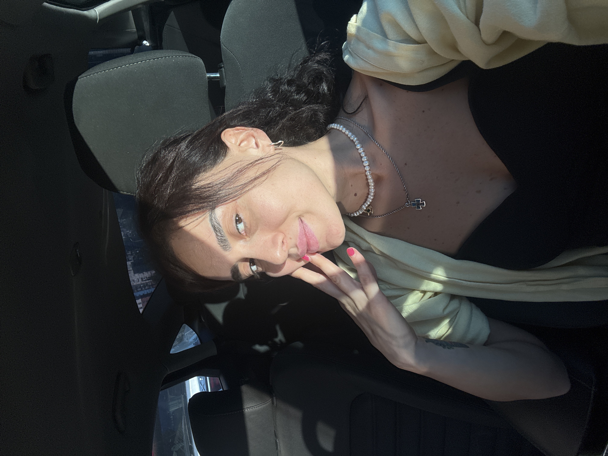 Candid passenger seat moments during a Tbilisi drive