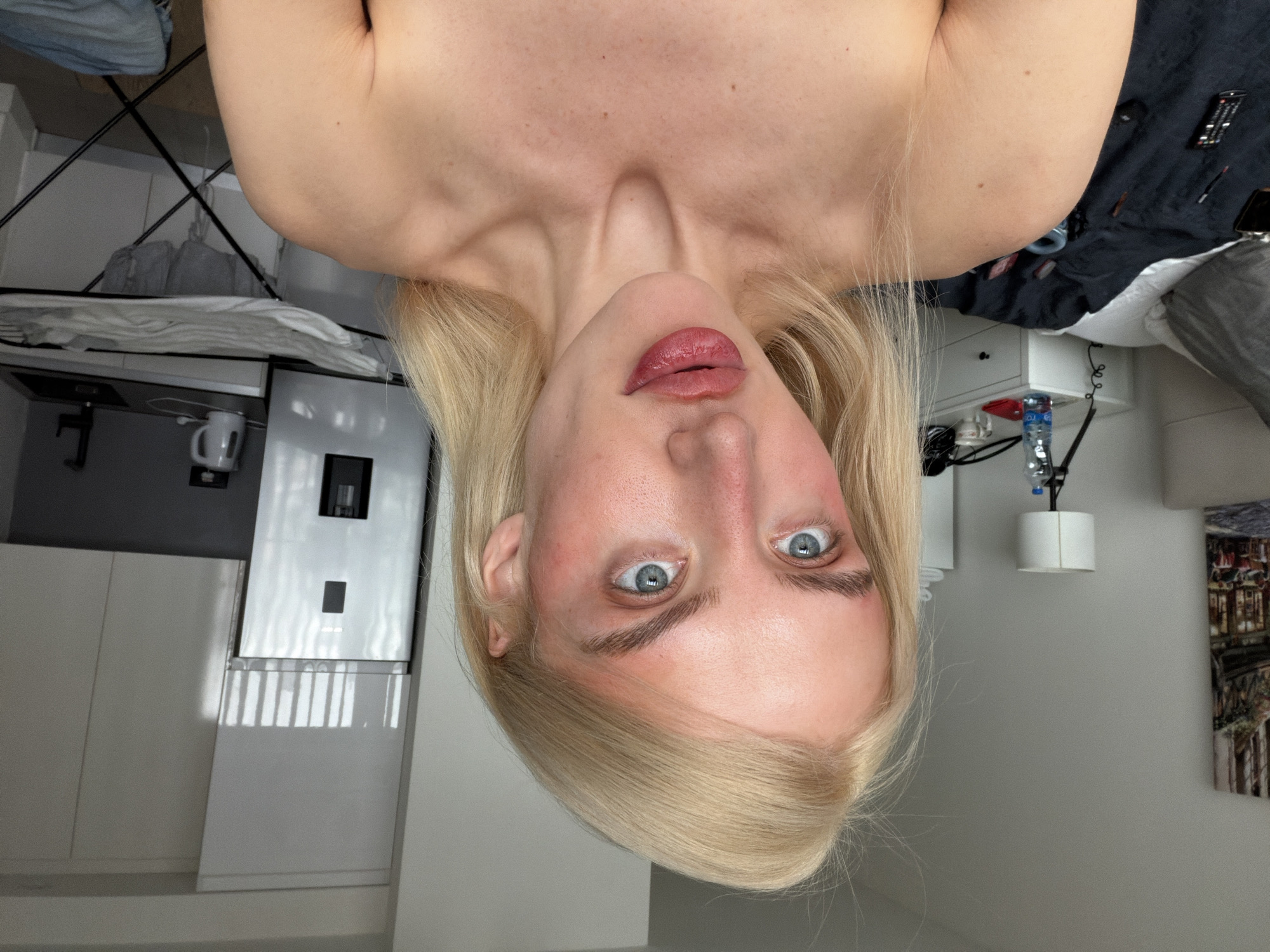Woman takes multiple selfies in Belgrade residential settings