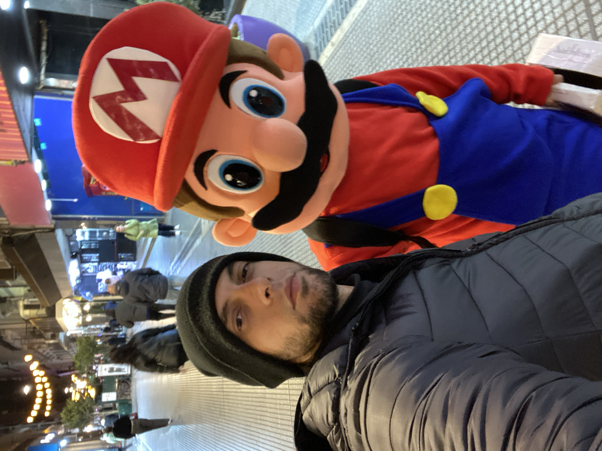 Mario mascot entertains pedestrians on Buenos Aires street
