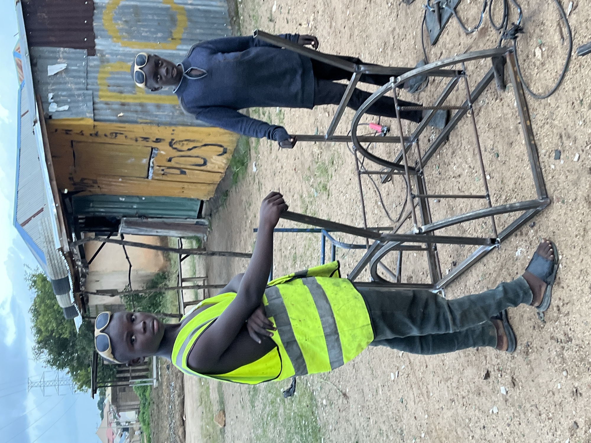 Street life, market bustle, and incoming storms in Jos, Nigeria