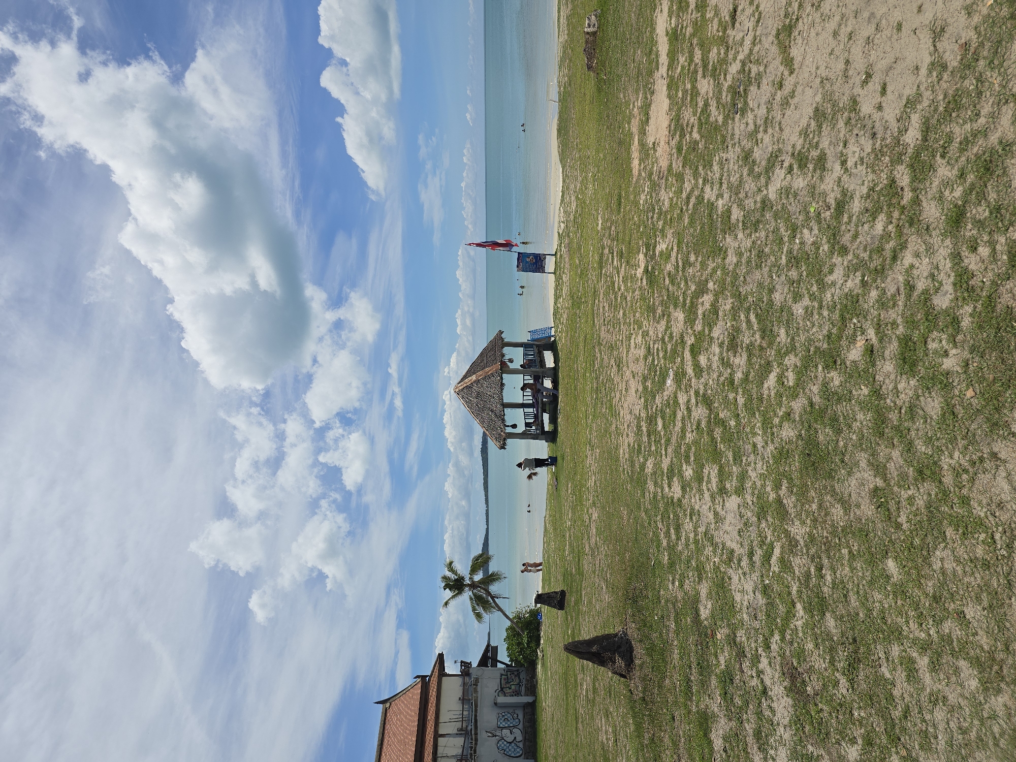 A relaxed morning along a tropical beach and its surroundings.