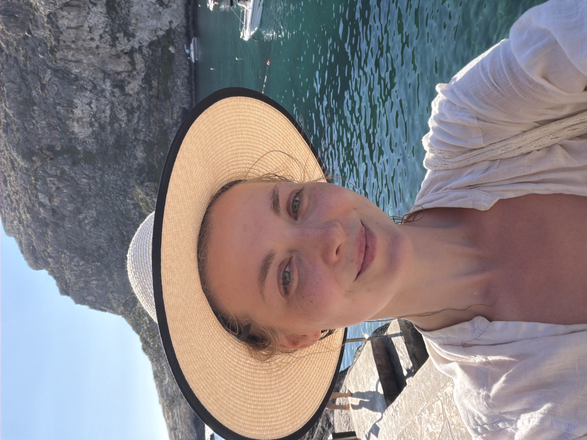 Xlendi Bay buzzing on a sunny Maltese summer afternoon
