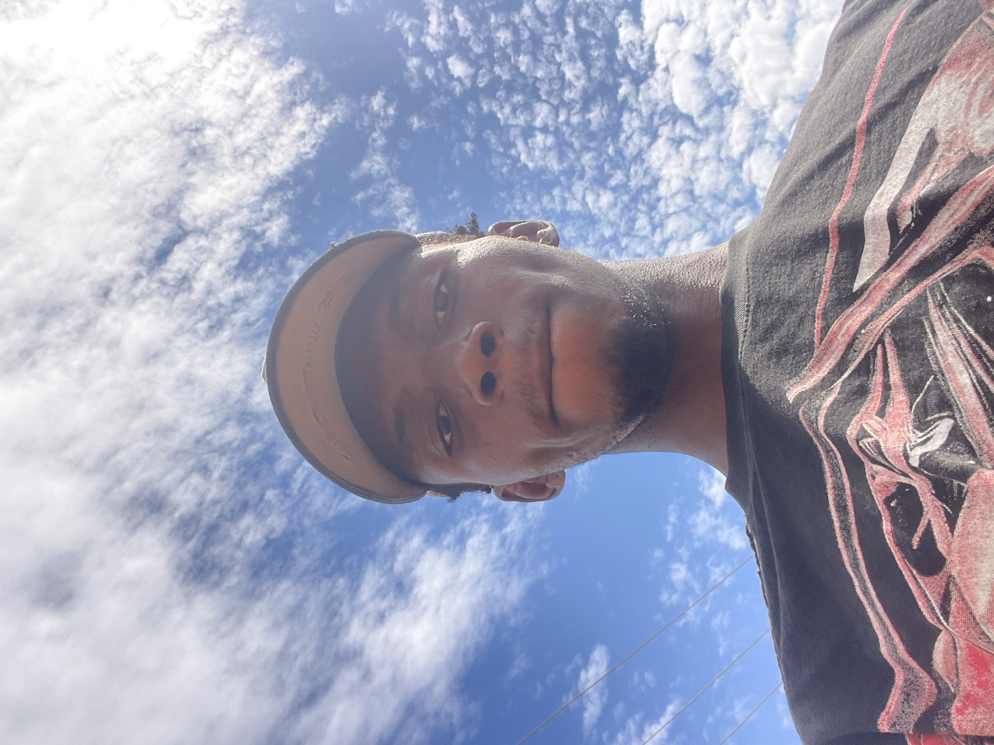 Young man photographs himself drinking, taking selfies in Lokoja