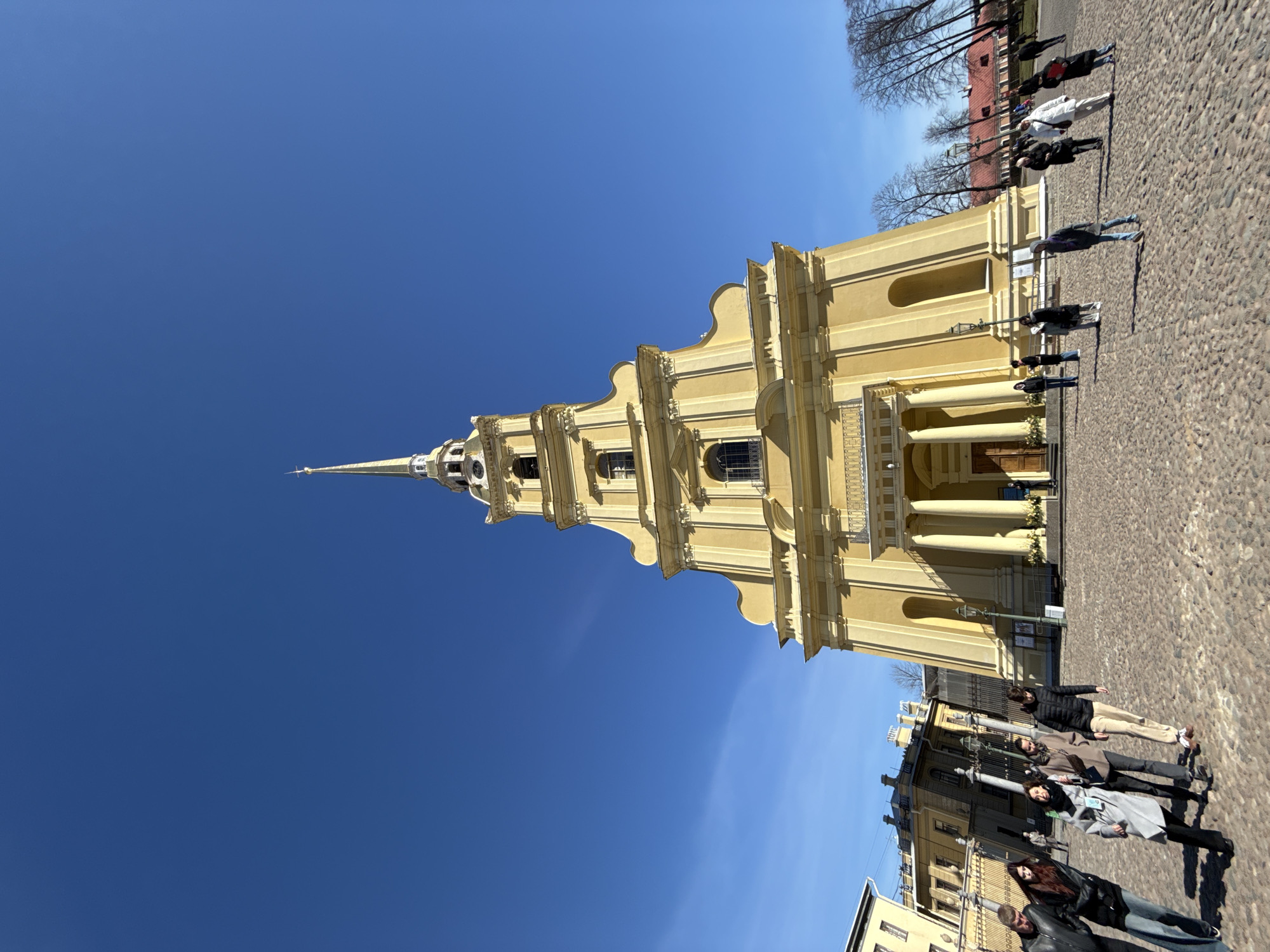Tourist documents sunny morning visit to Peter Paul Fortress