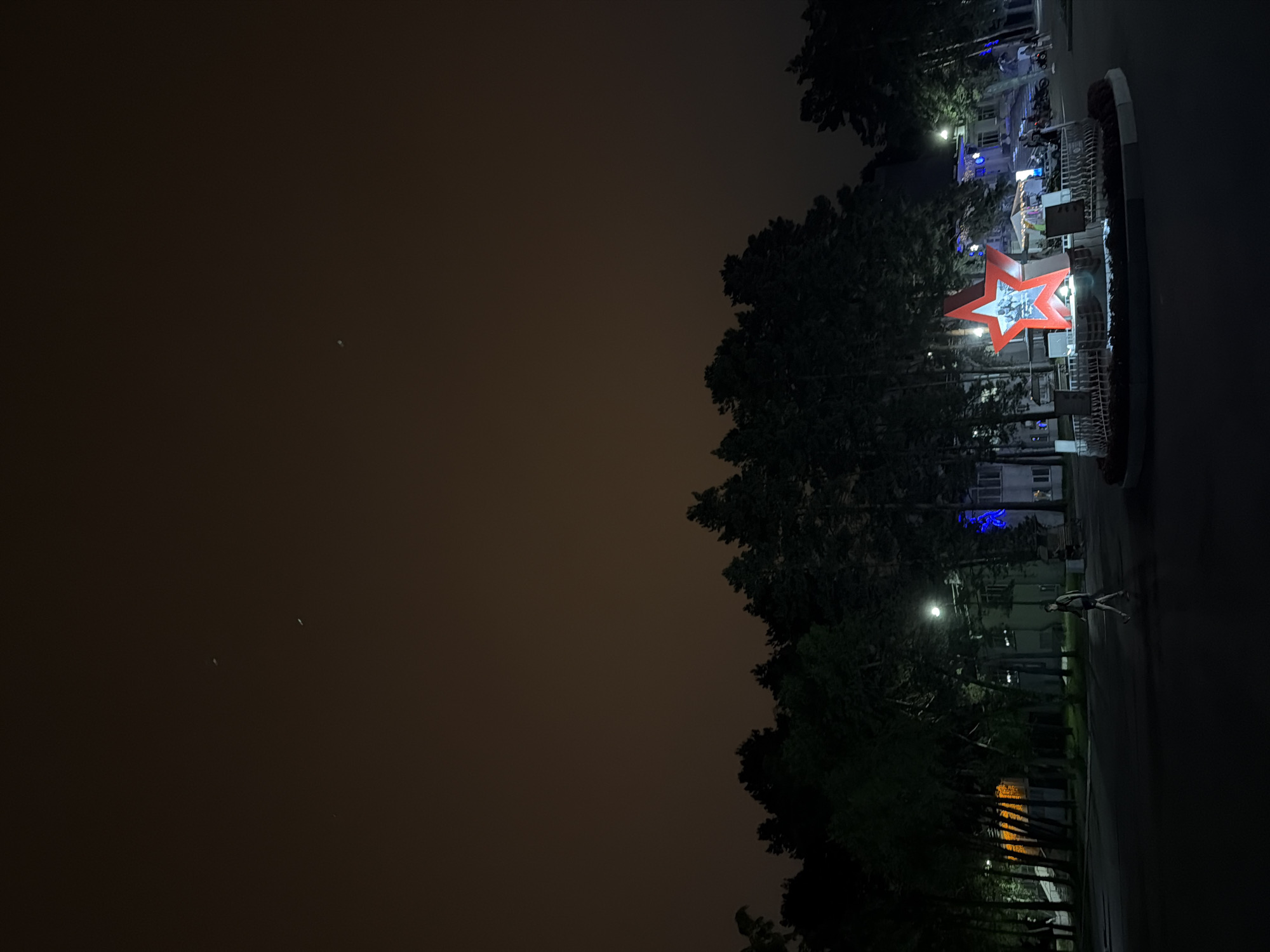 Khabarovsk at night: monuments, neon, and wet streets