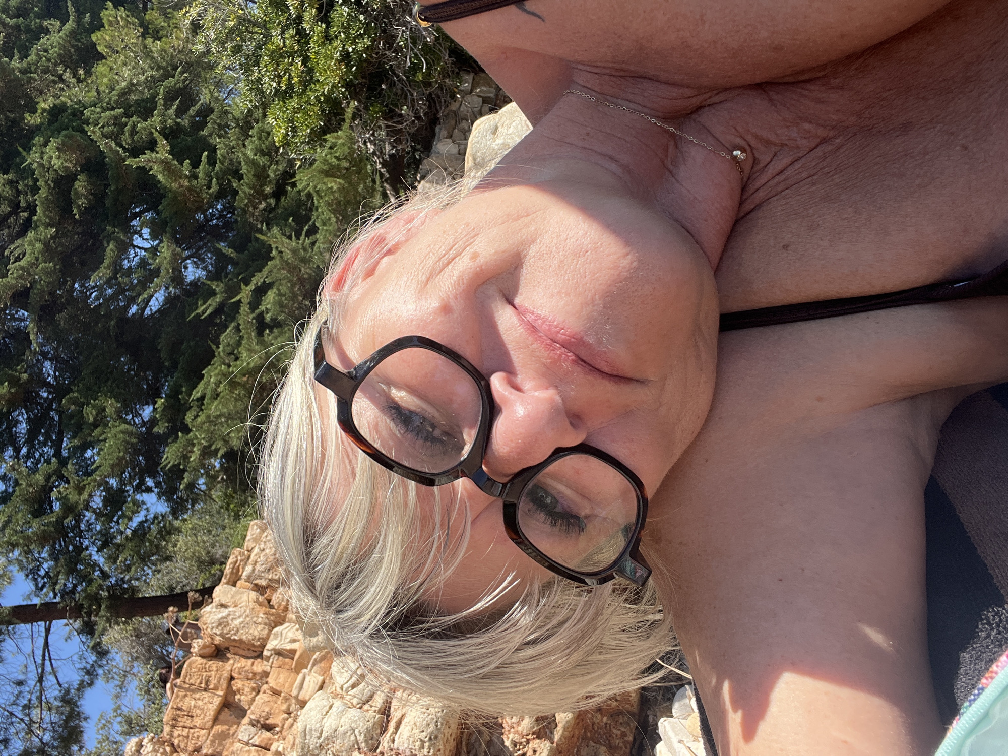 Lazy morning on a Cannes pebble beach with a hashtag drop