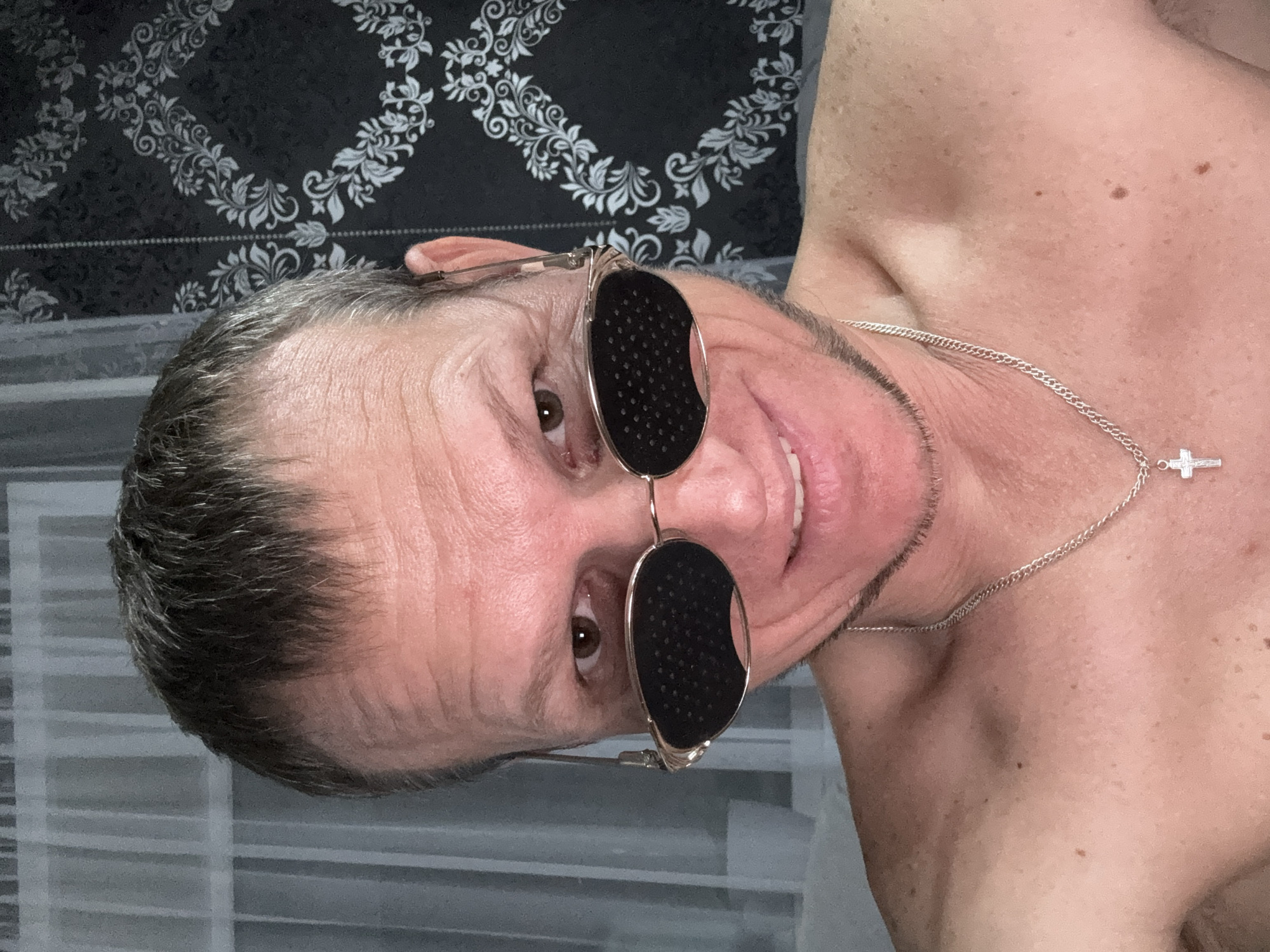 Relaxed selfie session in Oskemen, pinhole glasses and peace signs
