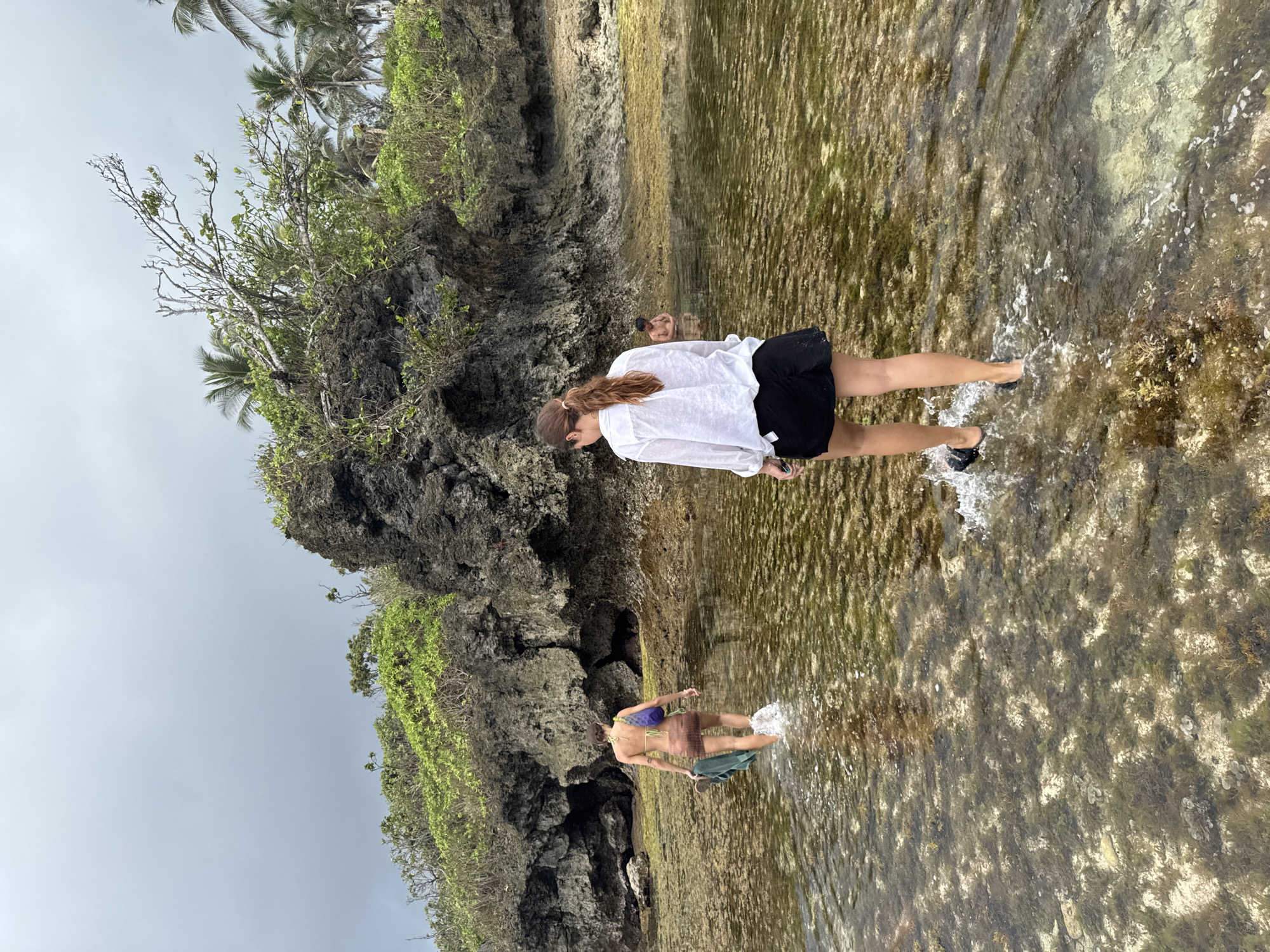 Early morning coastal activity documented near lighthouse in San Isidro