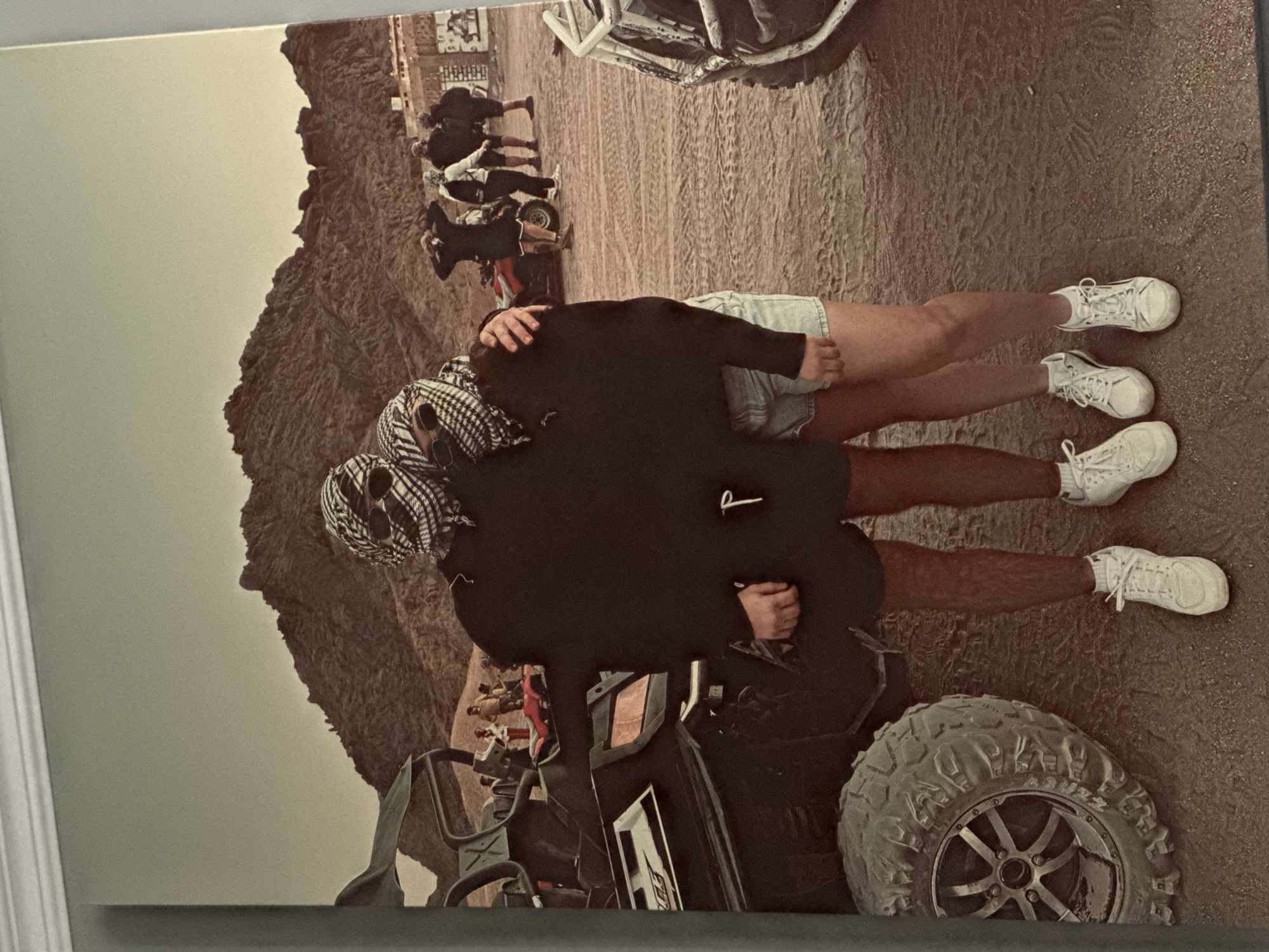 Domestic scenes documented featuring desert embrace artwork, vanity setup