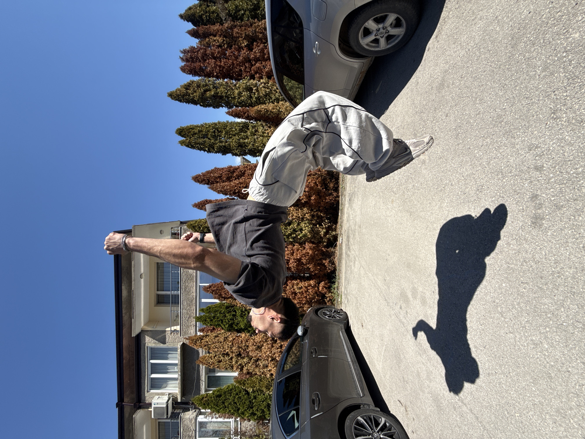 Man performs backflips on street in Shumen, Bulgaria
