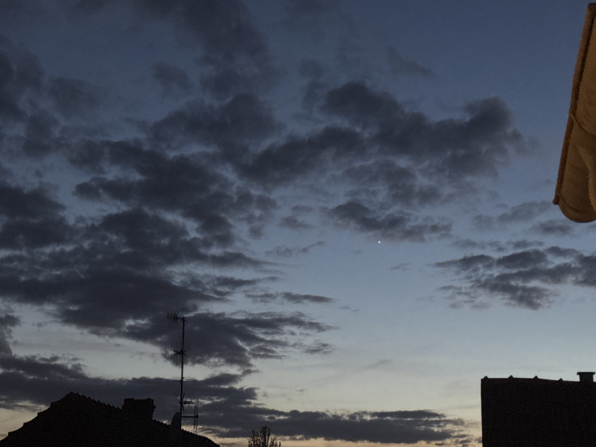 Twilight sky displays color gradient over Bischheim, France
