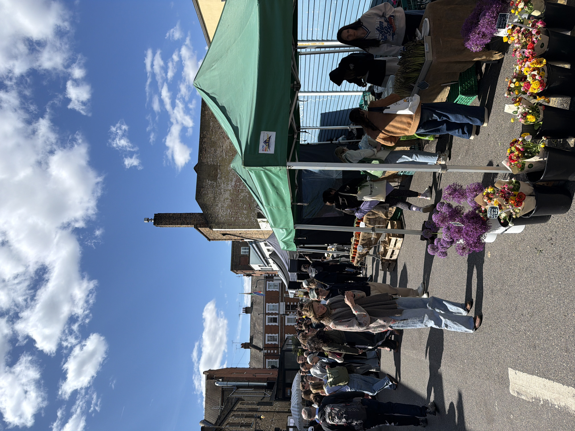 London outdoor market features flowers and Caribella products