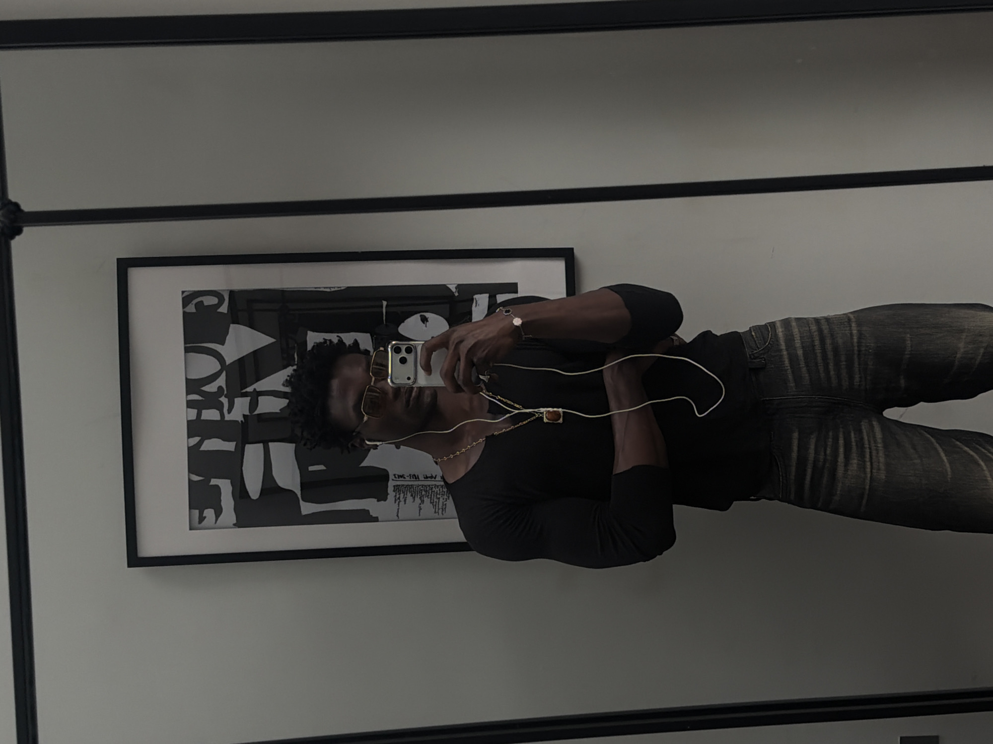 Mirror selfie, casual fit, London.