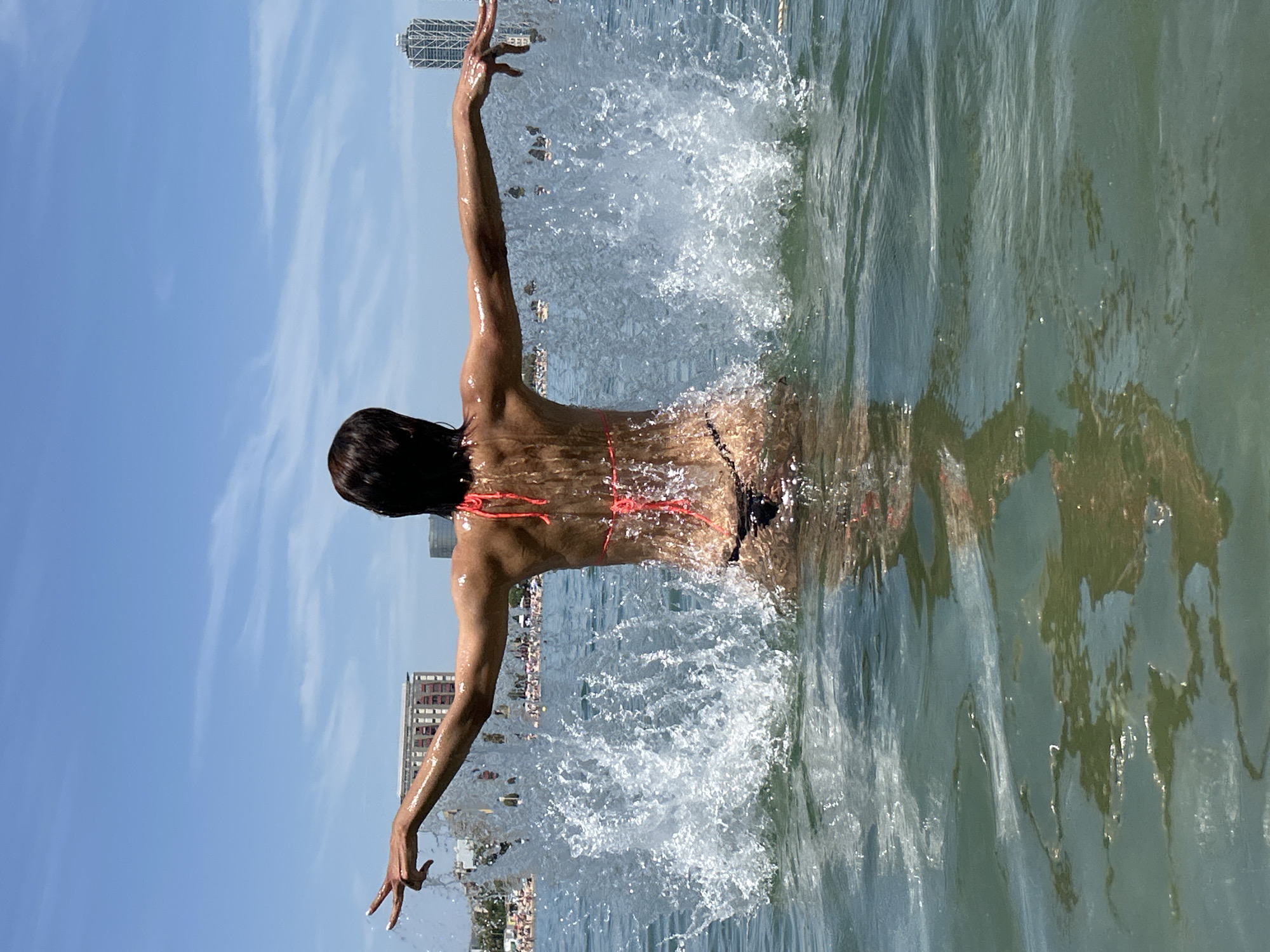 Beach day near Barcelona's W Hotel with swimming and sunbathing