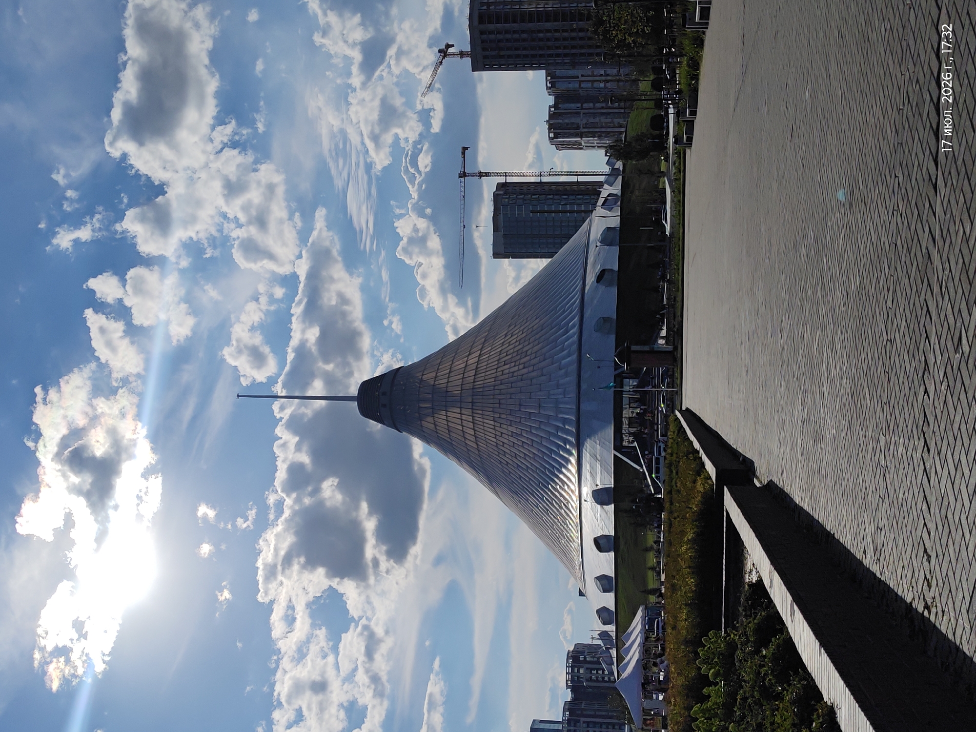 Afternoon in central Astana: fountains, skyline, and street-level details