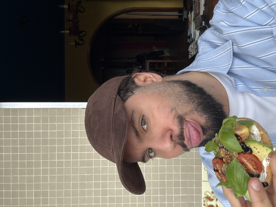Man enjoys avocado toast breakfast in Vila Nova de Gaia