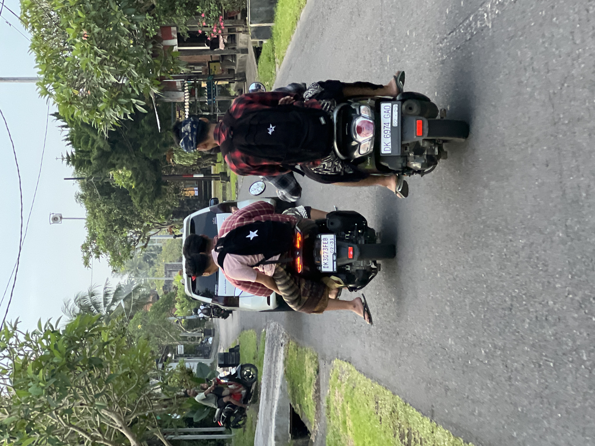 Scooters spotted on road in Singakerta, Indonesia