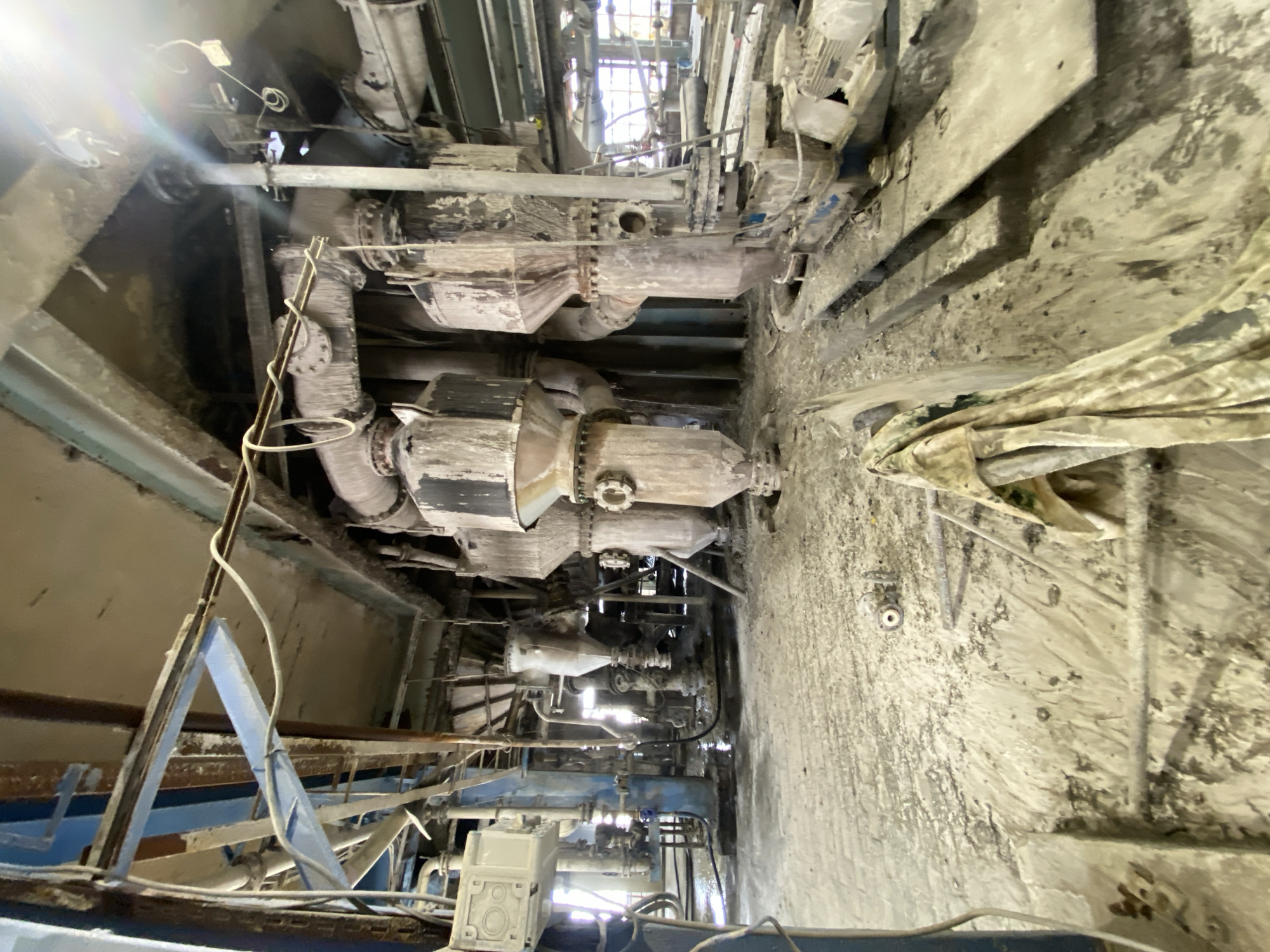 Inside a dusty, aging industrial plant in Police, Poland
