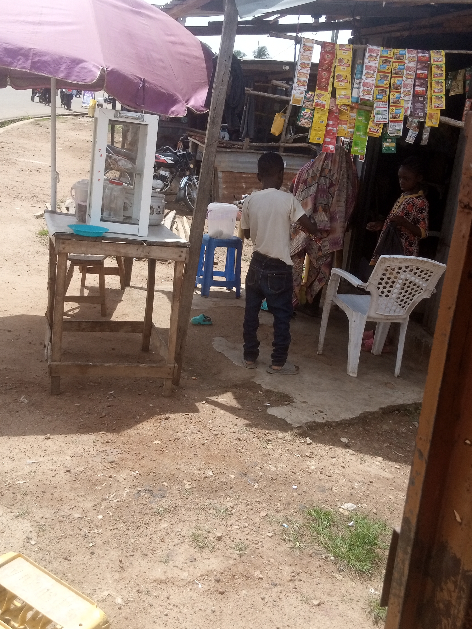 Street life, vendors, and construction in an African urban setting