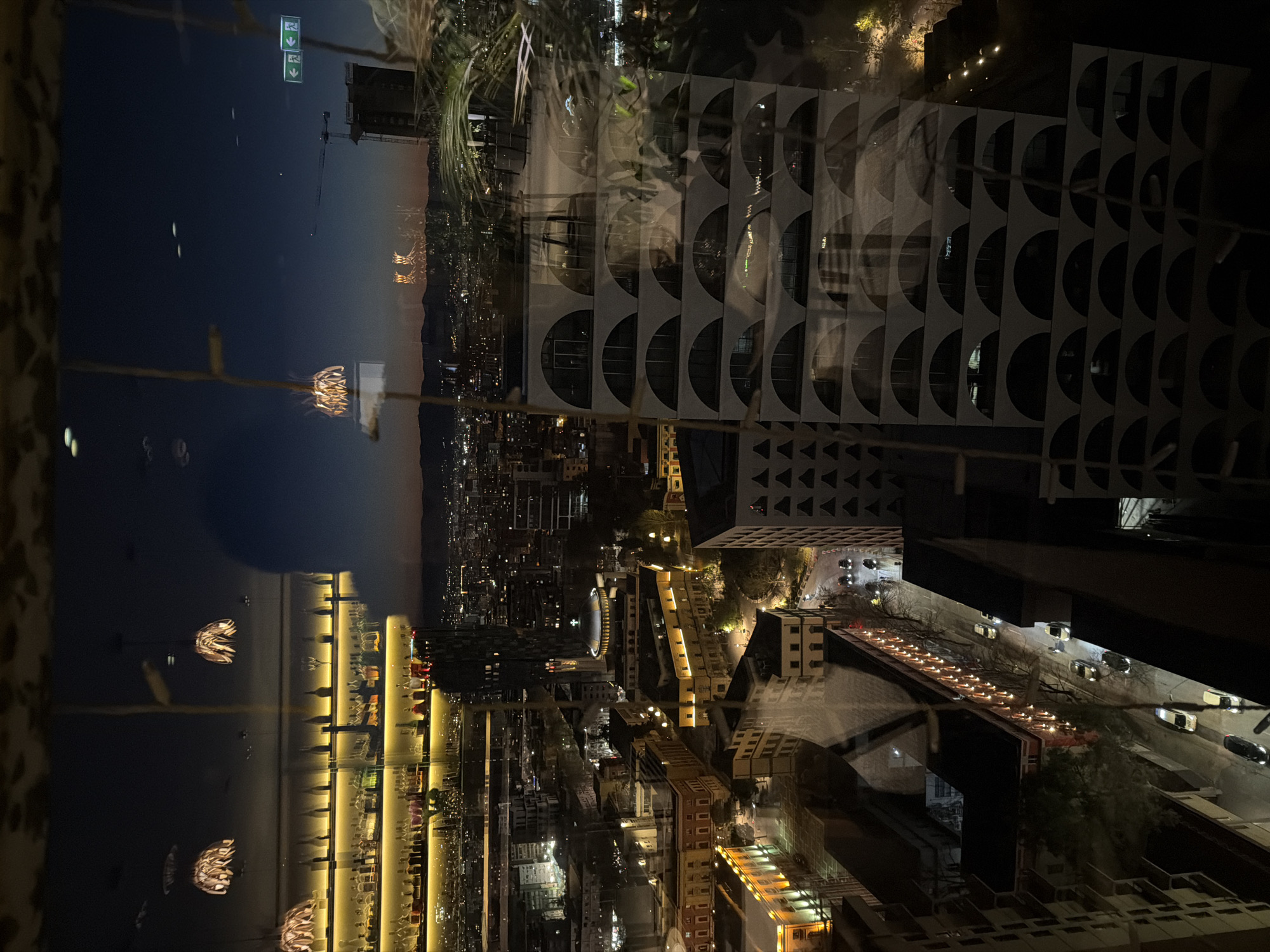 Piano performance captured alongside Tirana nighttime cityscape views