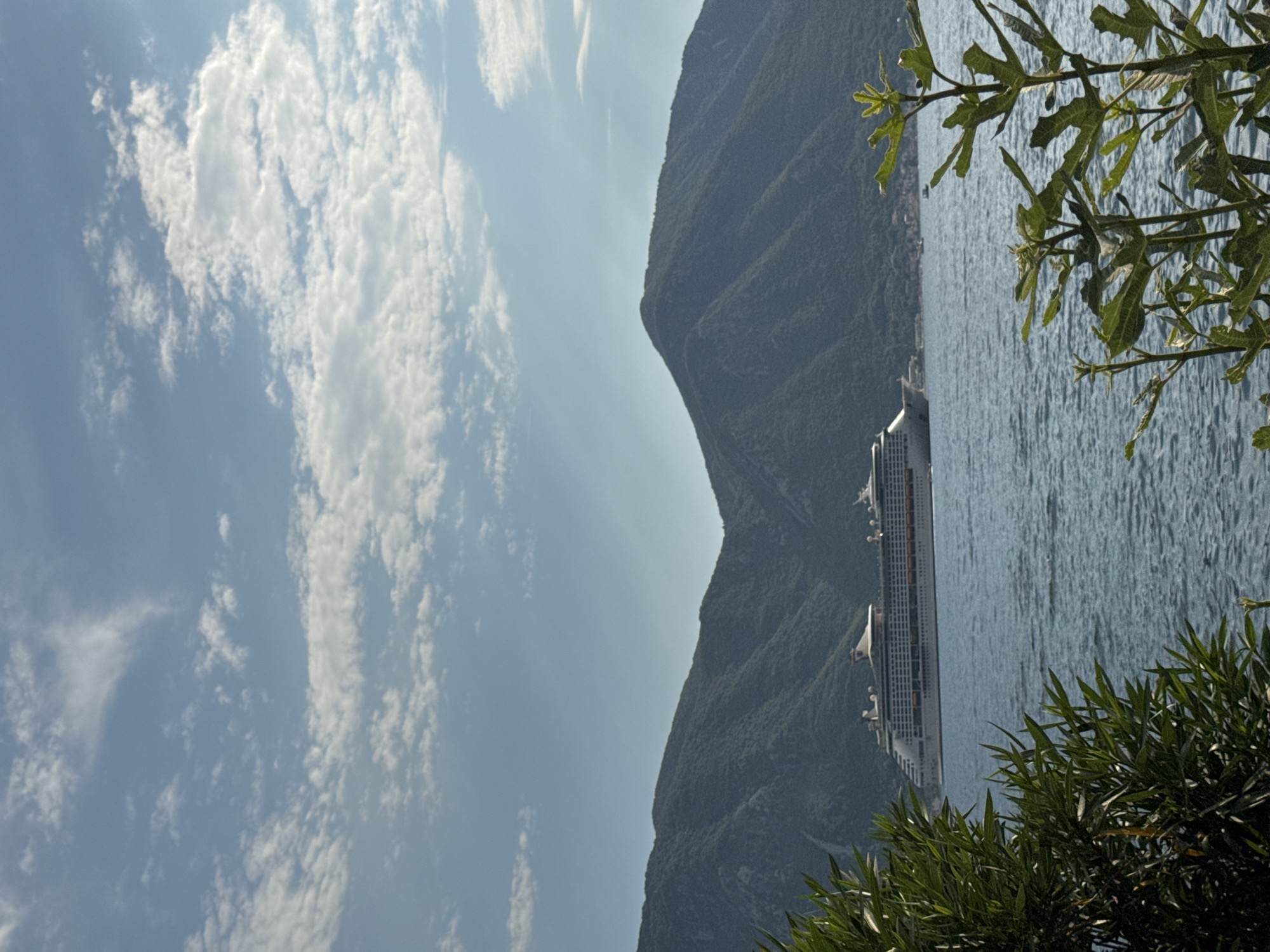 Cruise ship anchored in the calm Bay of Kotor