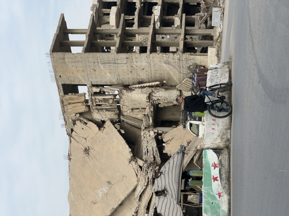 Daily life documented amid damaged buildings in Damascus area